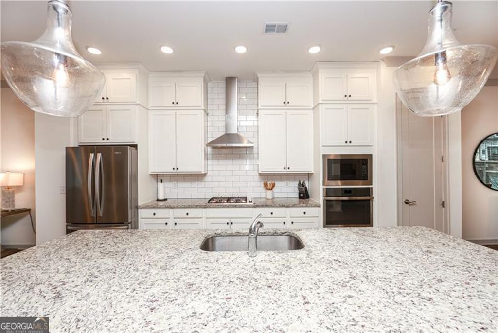 Photo of 810 Kenway Avenue, Alpharetta, GA 30076 (MLS # 10690738)