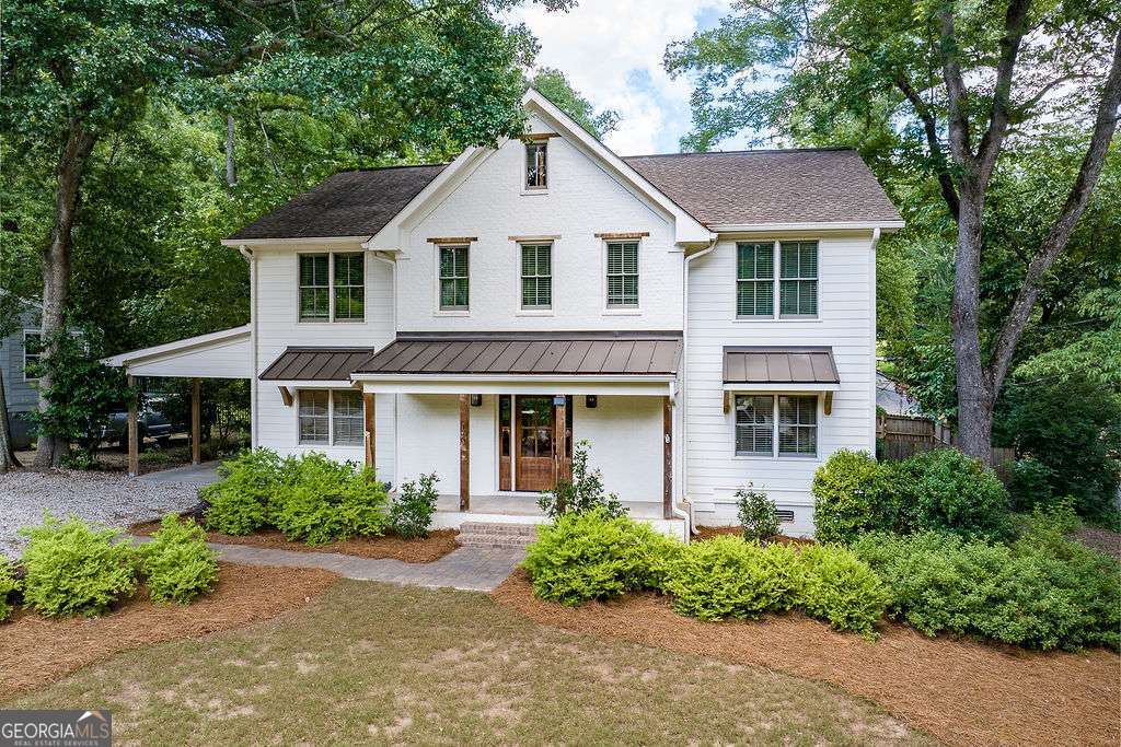 175 Pinecrest Court in Athens, GA is a beautifully remodeled home offering the perfect combination of location, comfort, and craftsmanship. Originally built in 1956, this home was extensively renovated in 2018 by Right Angle Construction. Approximately 3,100 square feet of living space, the home features four bedrooms, three and a half bathrooms, and an open layout that includes a main-level owners suite with a large bath and custom closet, along with a bonus room for a home office, nursery, or den. The kitchen is designed for entertaining and everyday living, complete with a large island, gas range, and abundant cabinetry. High ceilings, double-pane windows, hardwood flooring, and updated mechanicals. Situated on a corner lot, the fenced backyard includes a back porch, patio and firepit along with a storage shed. Located right beside the University of Georgia in the Five Points neighborhood, this property offers quick access to campus, local dining, and UGA sporting events.