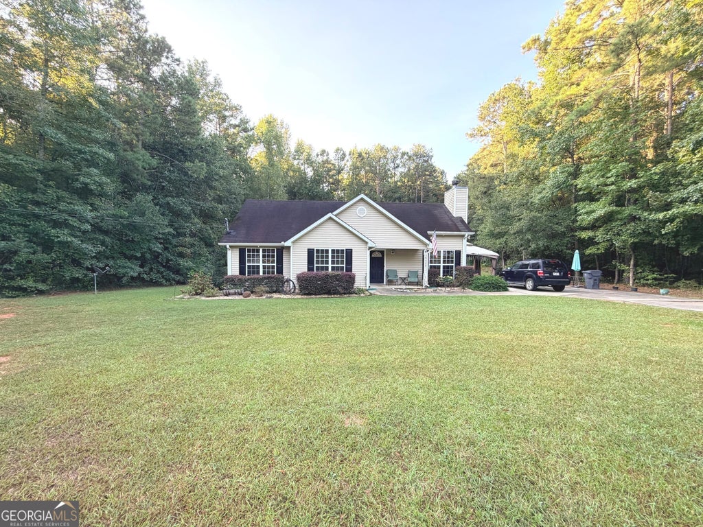 Photo of 334 Evans Road, Milner, GA 30257 (MLS # 10845001)