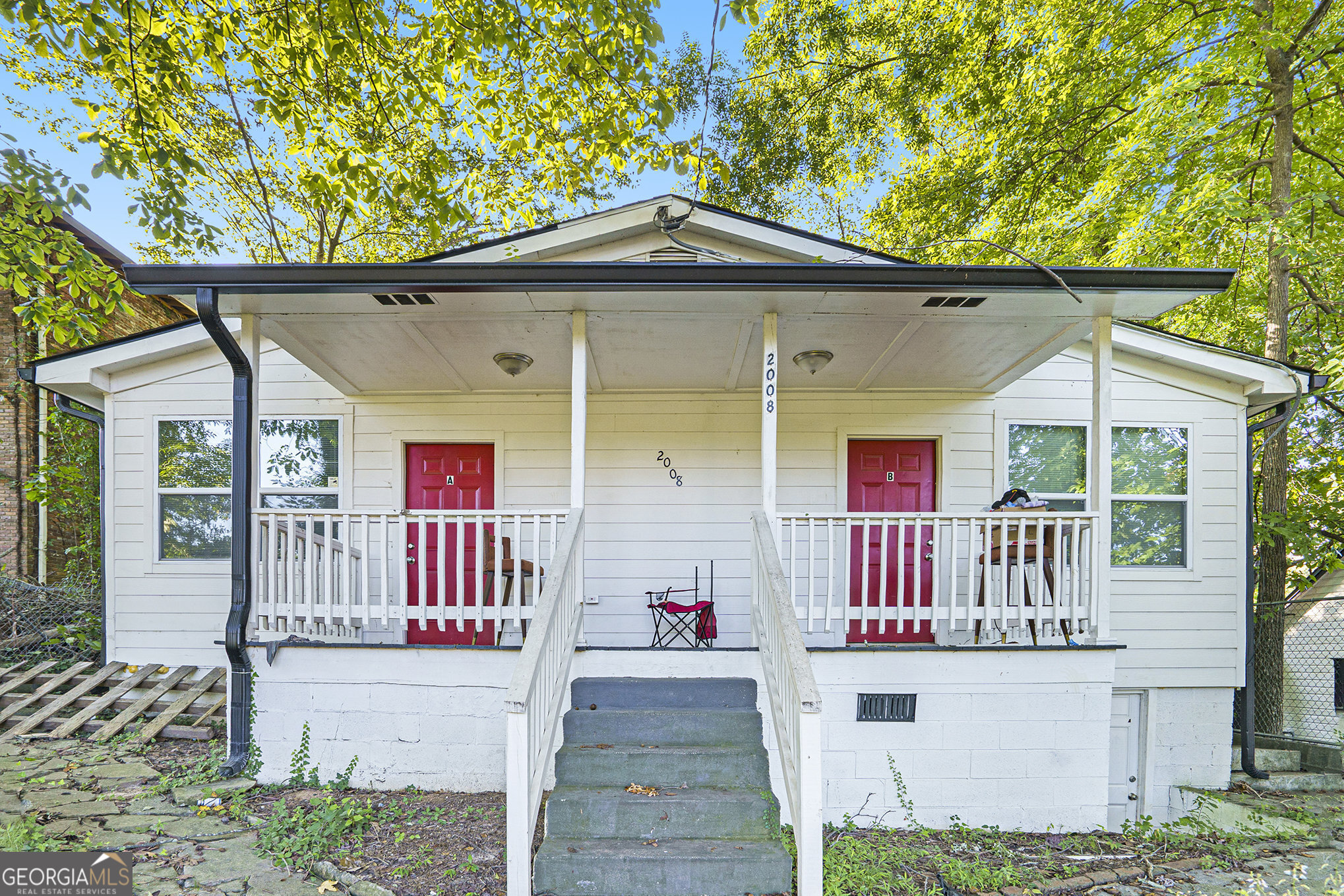 Discover an income-producing opportunity in the heart of Historic NW Atlanta! This all-electric duplex features two spacious 2-bedroom, 2-bathroom units, each with its own private entrance and laundry space. Currently vacant, the property is ready for its next owner to move right in or place tenants immediately. Whether you're an investor looking to maximize rental income or a buyer seeking the perfect live-in/lease-out setup, this property checks every box. No HOA means more flexibility and lower costs. Located just minutes from the upcoming Microsoft Campus, Westside Park at Bellwood Quarry, the Westside BeltLine, Mercedes-Benz Stadium, and the dining and entertainment of West Midtown and Downtown, this property offers convenience, growth, and long-term upside. Don't miss your chance to own this competitively priced duplex in one of Atlanta's fastest-growing corridors!
