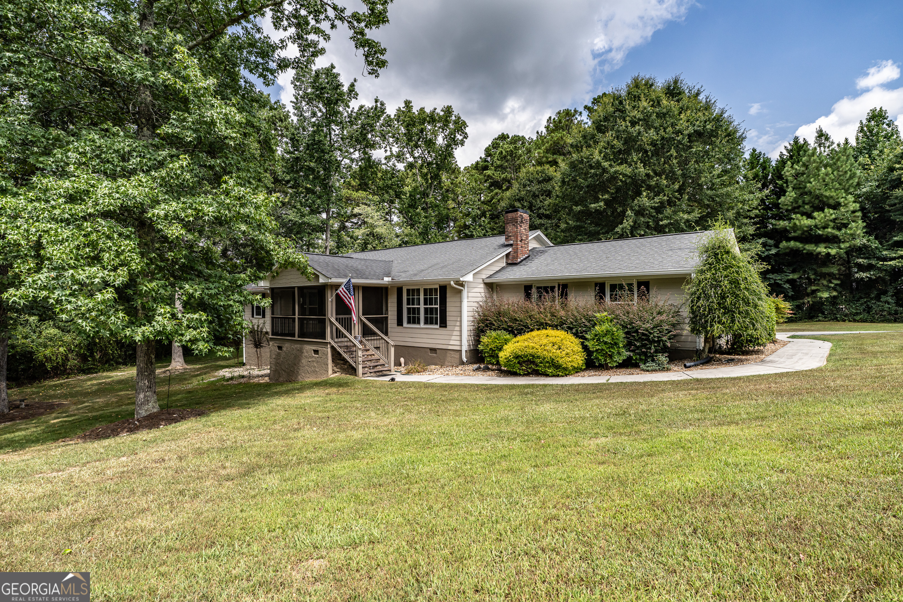 Beautiful 4-bedroom, 3-bathroom home on 2.53 acres in Highpoint subdivision! This well-maintained property features an open kitchen that flows into the dining area and a spacious living room with a cozy fireplace. The oversized primary suite includes a walk-in closet and a gorgeous tile bathroom with a custom shower. Additional bedrooms are spacious, many with walk-in closets. Enjoy hardwood floors, plenty of storage, and an attached 2-car garage. Relax on the screened-in front porch and enjoy the privacy of the large, fenced backyard. Don't miss this opportunity!