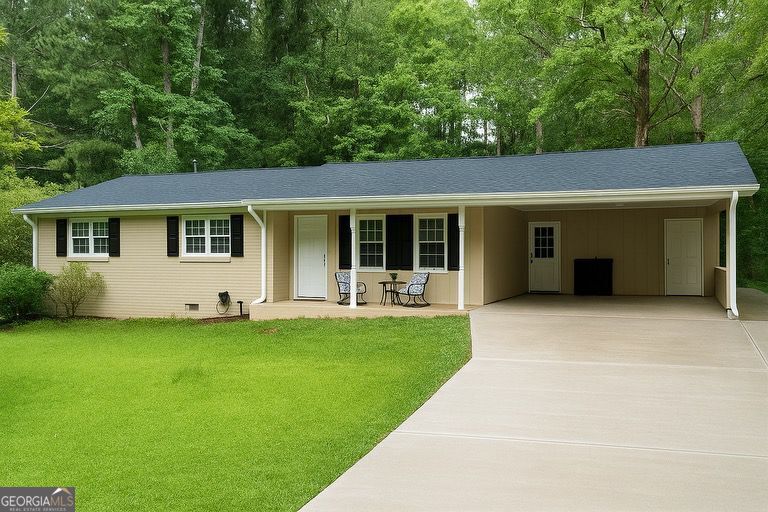 This house features three spacious bedrooms and two bathrooms, with beautiful hardwood floors in the main living areas. Discover this wonderful home located in the Alexander High School district! Situated on an expansive half-acre lot, this property offers plenty of outdoor space for your enjoyment. The backyard features a large shed, providing additional storage or workshop space. NO HOA! Conveniently located near I-20, you'll have easy access to the vibrant City of Atlanta. This home is being sold "AS IS," Don't miss out on the chance to make this property your new home!