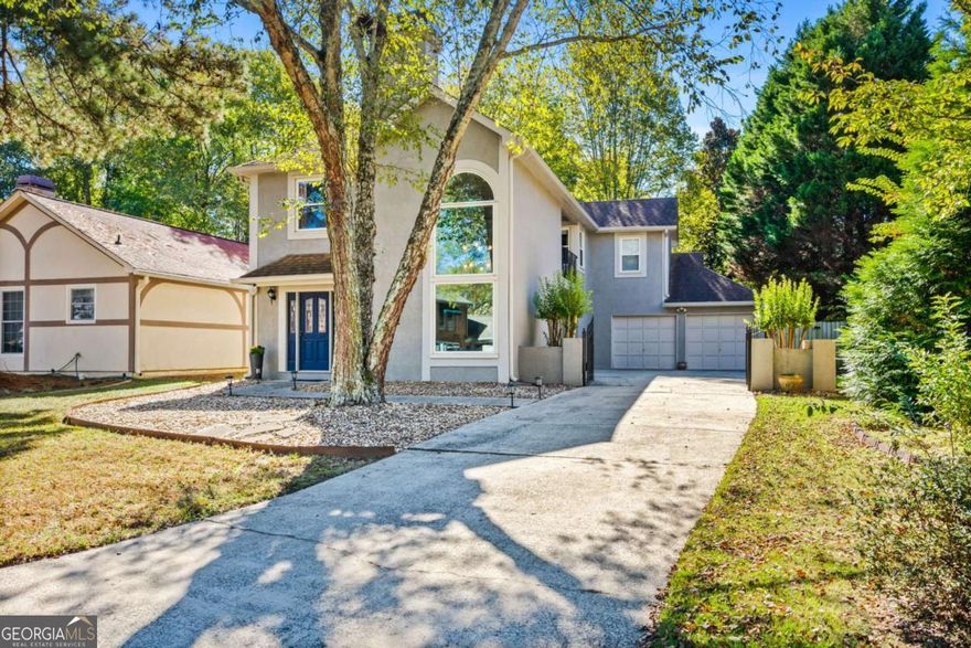 Tucked at the end of a quiet cul-de-sac, this Alpharetta home offers a rare sense of peace and connection, surrounded by mature trees and a welcoming neighborhood atmosphere. The natural light that fills the main living spaces adds warmth to everyday, with an open flow that makes the home feel both comfortable and airy. Beyond the doorstep, the location shines. Just minutes from downtown Alpharetta and Avalon, you'll have access to some of the area's best dining, boutique shopping, and local entertainment. Commuting is effortless with quick access to GA-400, and the home's proximity to top-rated schools adds another layer of appeal.  Whether your perfect day includes a morning stroll through Avalon, an evening at a local restaurant, or simply unwinding at home, this address places you at the center of it all. 1050 Essex Court delivers the lifestyle Alpharetta is known for-peaceful, convenient, and effortlessly livable
