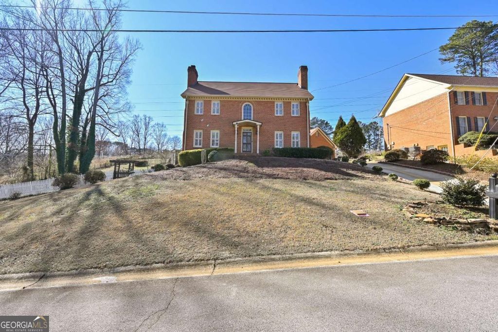 Photo of 110 Amsterdam Drive SW, Lilburn, GA 30047 (MLS # 10724635)