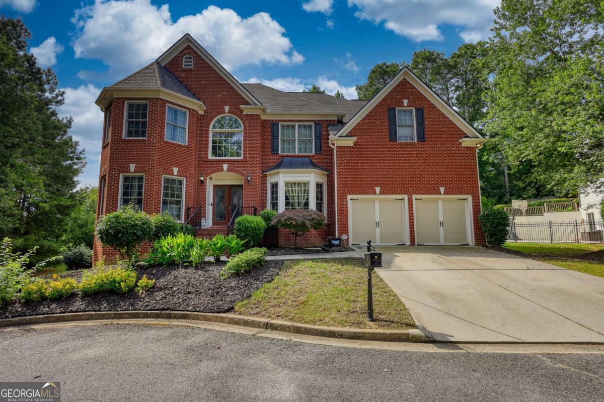 Motivated Seller! Walk to Amenities - Spacious 5BR/4BA Home on Private Cul-de-Sac Situated on a rare, oversized lot in sought-after Hamilton Mill, this light-filled home features an open floorplan with ample space for living and entertaining. The only home in its private cul-de-sac, it offers unmatched privacy and curb appeal. Enjoy walking access to neighborhood amenities including pool, tennis courts, clubhouse, and more. Highlights include generous living areas, well-appointed kitchen, and versatile bedroom layout-perfect for multi-generational living or a home office. Expansive backyard provides room to create your dream outdoor oasis. Call Ashley to schedule your private tour today!