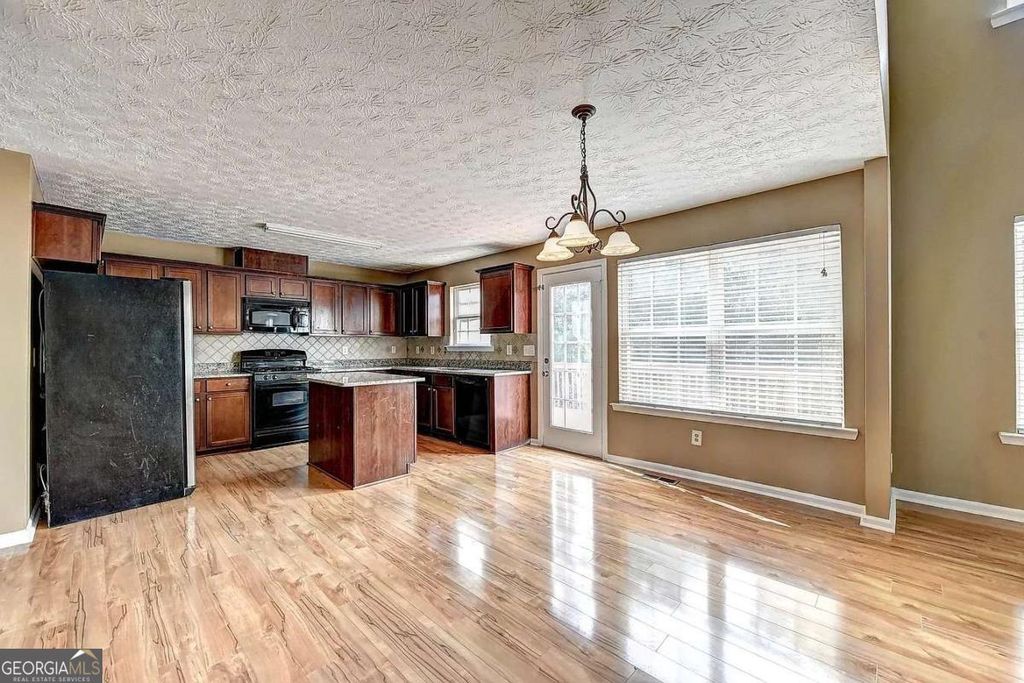 Photo of 670 Roxford Ln, Buford, GA 30518 (MLS # 10660889)