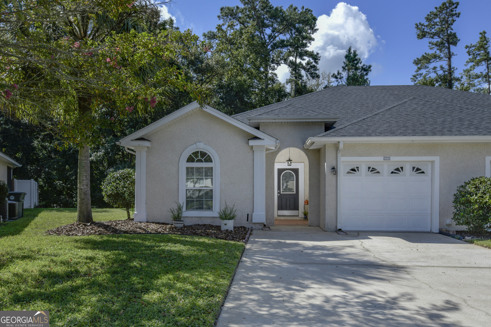LIVE YOUR BEST LIFE IN THIS CHARMING TWO-BEDROOM HOME IN LAUREL ISLAND PLANTATION. THE EXTERIOR FEATURES LOW-MAINTENANCE TABBY SIDING, A SCREENED LANAI OVERLOOKING A PEACEFUL PRESERVE, AND A PATIO THAT'S PERFECT FOR GRILLING. MATURE TREES ON THIS PARTIALLY WOODED LOT PROVIDE PLENTY OF PRIVACY. INSIDE, YOU'LL FIND A SPACIOUS GUEST BEDROOM AND FULL BATH OFF THE FOYER THAT LEAD INTO THE OPEN FAMILY ROOM WITH SOARING CEILINGS. THE EAT-IN KITCHEN BOASTS GRANITE COUNTERS, A BREAKFAST BAR, WALK-IN PANTRY, AND A LARGE WINDOW OVER THE SINK THAT FILLS THE SPACE WITH NATURAL LIGHT. THE DINING AREA OFFERS DIRECT ACCESS OUTDOORS, MAKING ENTERTAINING A BREEZE. RETREAT TO THE PRIMARY SUITE WITH ITS CATHEDRAL CEILING, EXPANSIVE WALK-IN CLOSET, AND EN SUITE BATH FEATURING A DOUBLE VANITY AND A TILED WALK-IN SHOWER. TECH-SAVVY BUYERS WILL APPRECIATE THE INCLUDED RING DOORBELL AND NEST THERMOSTAT, OFFERING BOTH COMFORT AND PEACE OF MIND. THIS HOME SITS IN AN "X" FLOOD ZONE, MEANING NO FLOOD INSURANCE IS REQUIRED. LAUREL LANDING OFFERS CONVENIENT ACCESS TO SCHOOLS, SHOPPING, DINING, I-95, AND KINGS BAY SUB BASE. HOA DUES ARE JUST $1,052/YEAR AND INCLUDE LAWNCARE AND IRRIGATION WATER. COMMUNITY AMENITIES INCLUDE A POOL, FITNESS CENTER, PLAYGROUND, AND BEAUTIFULLY LANDSCAPED COMMON AREAS. EASY TO SHOW- SCHEDULE YOUR TOUR TODAY!