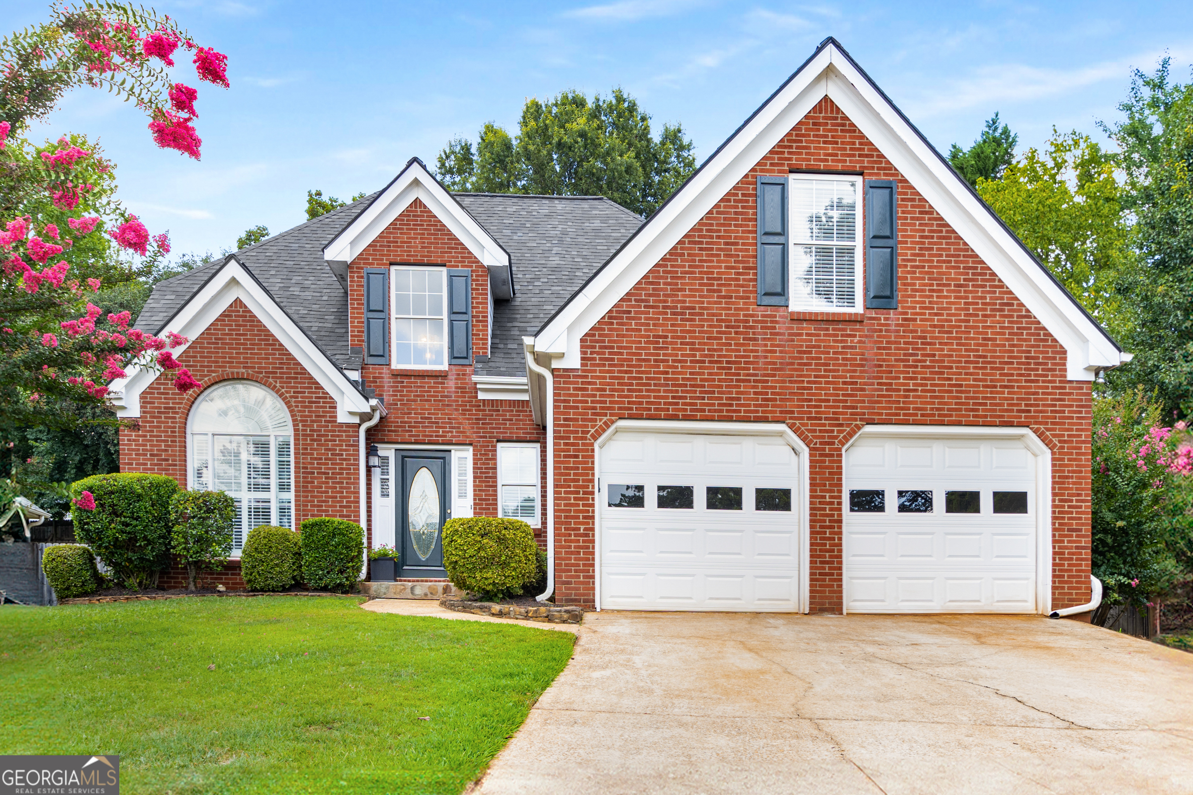 This popular Decatur neighborhood is located just minutes from the vibrant shops, restaurants, and parks of both Avondale Estates and downtown Decatur, offering easy access to these thriving and sought after areas. Enjoy trails and green spaces just steps away at Decatur's 22-acre Legacy Park, the PATH and top rated public and private schools, from elementary to college at nearby Agnes Scott and Emory University! 874 Ashwood Walk is nestled on a large, cul-de-sac lot and features a main level Owner's Suite. Recent improvements include a renovated kitchen, plus a newer roof, HVAC system and water heater - the big stuff is already done! Inside you will discover an inviting an open living level with lots of natural light, separate dining room and a spacious kitchen and breakfast area which opens to the sunny back yard and patio for grilling and entertaining! The large great room features a center fireplace and soaring ceilings, plenty of room for family and friends. The primary bedroom suite on the main level offers easy living and features a large bathroom with double vanity, separate tub and shower, and extra-large walk-in closet. Upstairs you will find three large bedrooms and a full bath, plus a huge bonus room above the garage giving multiple options, whether it be a fourth bedroom, home office or large playroom! More photos coming soon! Don't miss this chance to experience the best of both worlds in this prime location - a quiet neighborhood retreat and easy access to the bustling energy and community vibe of Decatur and Avondale.