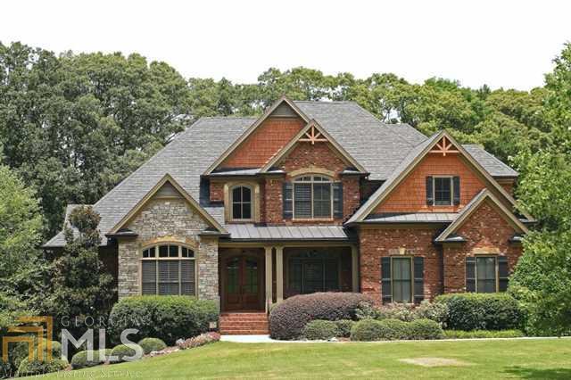 Lovely executive home on large secluded lot. All the plus upgrades in this one! Screened porch for morning coffee. Spectacular walk-in pantry. Keeping room with fireplace. Extensive molding thru-out this custom built home. Master suite on main level with great room, formal dining room and study. Professional landscaping with zoned irrigation system, third garage on lower level with workshop. Upper level features 3 bedrooms, 2 full baths and loft area. Terrace level is already wired and just waiting for your design. Patio under deck with perfect place for hot tub. Firepit also.