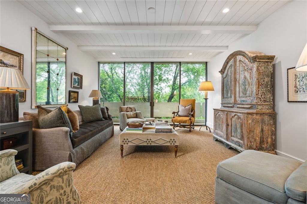 Welcome to our new listing at Plaza Towers! Have you ever longed for the quiet comfort and coziness of an intown cottage home, combined with the convenience and location of high-rise livingPlea? If so, please consider making 8D Plaza Towers your new home. This stunning treetop-level home combines all the simplicity of "Lock and Leave" with the ambience of a cozy single family home in one of the city's most prestigious buildings. 8D offers charming views of the nearby church steeples and the twinkling Buckhead skyline at night. Balcones face north and west for ever-changings and wonderful sunsets. Recently remodeled by Clark Interiors, this home features exquisite custom details, including beamed ceilings throughout, and custom-milled vertical plank doors. Enjoy cooking in the newly opened up kitchen featuring string Arabescato countertops, custom cabinetry, and new appliances. Luxurious touches continue in the bathrooms where new high-end bath and light fixtures and natural stone surfaces (Dolomite and Carrera) create a spa-like ambience. Designed for both style and comfort, this home boasts recessed LED lighting on differs, rich oak hardwood floors, and automated blinds. The sliding glass doors to the balconies are coated with a 3M file for sun control. Custom drapery, which will remain in the kitchen and primary bedroom, adds an extra layer of sophistication. Plaza Towers also features a stunning Club Room and a state of the art Fitness Center for your needs. Outside your home, a 24-hour Concierge is a helpful set of extra hands for things like deliveries packages, visitor entry and other daily needs. Guests may avail themselves of one of three guest suites while visiting a resident. And there is a grassy Dog Park for your furry friends. Your client will appreciate the financial integrity of the HOA. Please request information regarding the Budget, Reserves, etc. The HOA on-site manager is available by appointment to discuss any aspects of living in this phenomenal building. And if you should want to take a little walk to enjoy the neighborhood, you are just steps away from Atlanta's Duck Pond, a delight to all who visit. We invite you to see this special home for yourself. Easy appointment through ShowingTime. PS Please note first picture of exercise equipment is 8D's 2nd bedroom. There is a different photo of the actual Fitness Center, which looks out onto the private park/dog walk area beind the south building.