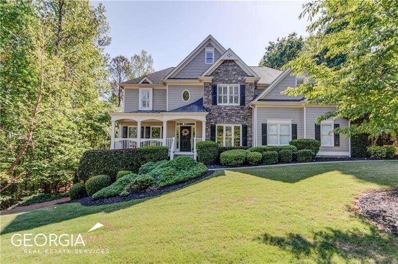 THIS HOME IS A BUYERS PARADISE!!! IMMACULATELY MAINTAINED AND FULLY UPDATED IN SOUGHT AFTER WILD TIMBER COMMUNITY IN THE NORTH GWINNETT SCHOOL DISTRICT! As you enter the 2-story Foyer, you will notice the beautifully refinished solid hardwood floors, new hardwood stairs and finished handrails. A large 2-story Family Room boasts floor to ceiling windows, plantation shutters and gas fireplace. Enter into the newly renovated white kitchen featuring quartz countertops with a stunning waterfall island, stainless appliances equipped with a wine/beverage cooler and butlers pantry. The main floor also features a private Office with double doors, a large Dining Room and a lovely Guest Room with a Full Bath. Explore the upper level split staircase into the oversized Owners Suite with custom walk-in Closet and newly renovated Ensuite Bath featuring a large soaking tub, seamless glass shower and dual sinks tastefully designed for todays modern buyer. The Secondary Baths have also been fully renovated with style and quality in mind. Two Additional Bedrooms complete this upper hallway. The other staircase leads to a spacious, open Loft with an adjacent Bedroom/Study. The Finished Terrace Level includes an additional Bedroom, a large Bath, an Entertainment/Media room as well as large storage and an additional finished Bonus Room! Both HVAC systems were replaced in this home in 2021 and a new water heater installed in 2020. The beautifully wooded backyard features a double sized deck and fence. A Private Lake, serene Walking Paths and Chattahochee River access are all located just footsteps away from this home. Wild Timber is a gorgeous community with outstanding amenities featuring 3 pools including an Olympic-sized pool, Swim Team, a Water Slide and Wading Pool; 5 Tennis Courts with Night Lighting, Stadium Seating and Tennis Team, Playground, Clubhouse and Volleyball.