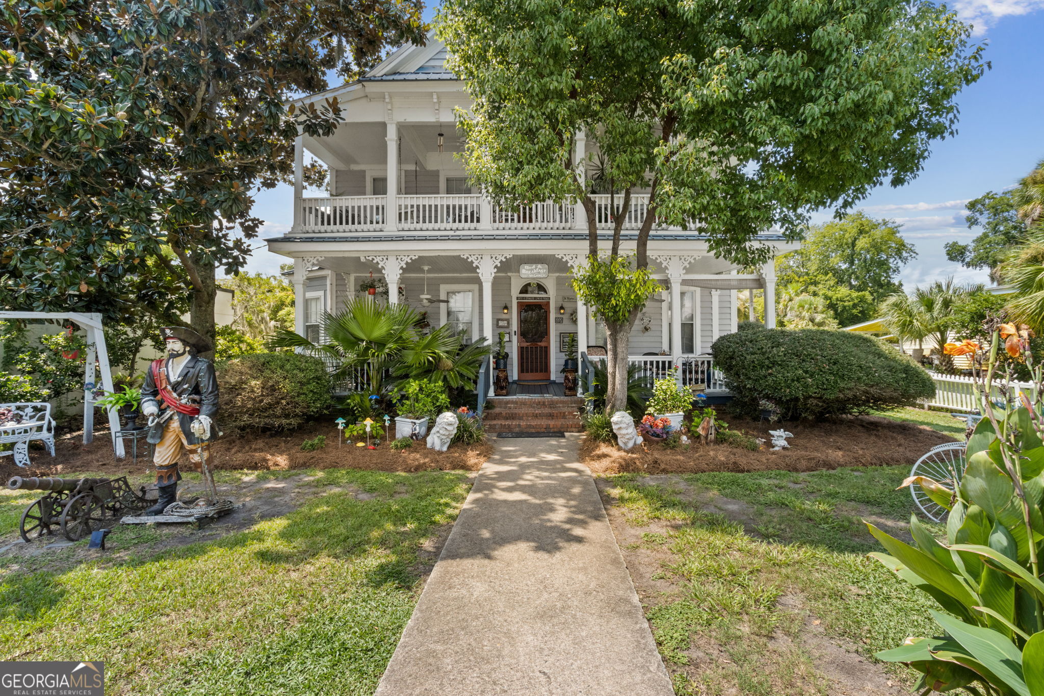 Goodbread House | Historic Victorian B&B or Dream Residence in Coastal St.Marys, GA Step into timeless elegance with the Goodbread House, a beautifully preserved circa-1870 Victorian masterpiece located in the heart of historic St. Mary's-America's second-oldest city and the gateway to Cumberland Island National Seashore. This 7-bedroom, 7-bathroom home blends rich architectural charm with modern amenities, offering a rare opportunity to own a turnkey bed & breakfast, vacation rental, or spacious private residence. Prime Coastal Location One and a half blocks from the St. Marys River and the Cumberland Island ferry-a top attraction for nature lovers and history buffs. Situated in the walkable downtown district, surrounded by restaurants, boutiques, galleries, and waterfront parks. Golf cart-friendly neighborhood in a charming, slow-paced village atmosphere. Property Highlights Seven uniquely designed suites, each with a private ensuite bath featuring both tubs and showers. Expansive front porch and second-story veranda with sweeping views-ideal for hosting guests or relaxing in coastal breezes. Warm Southern hospitality radiates throughout, from antique furnishings to thoughtful details like themed rooms and cozy common spaces. Known for its memorable breakfast experiences, social hours, and concierge-style guest services. Business-Ready & Guest-Loved Fully operational bed & breakfast with strong booking history and glowing guest reviews for location, service, and comfort. Pet-friendly with no additional fee-an added perk for vacationers exploring the waterfront with furry friends. Easily adaptable for use as a vacation rental, boutique inn, private home, or event venue for small gatherings and retreats. Perfect For: Entrepreneurs seeking a hospitality business with character and a strong tourism draw. Investors looking for a highly rated, income-producing property in a sought-after destination. Buyers dreaming of a historic coastal home with income flexibility and charm in every corner. This is more than a home-it's a piece of St. Mary's history, ready to write its next chapter. Whether you're looking to run a beloved inn or simply soak in the beauty of a Southern coastal town, the Goodbread House is an unforgettable opportunity. Schedule your showing today!