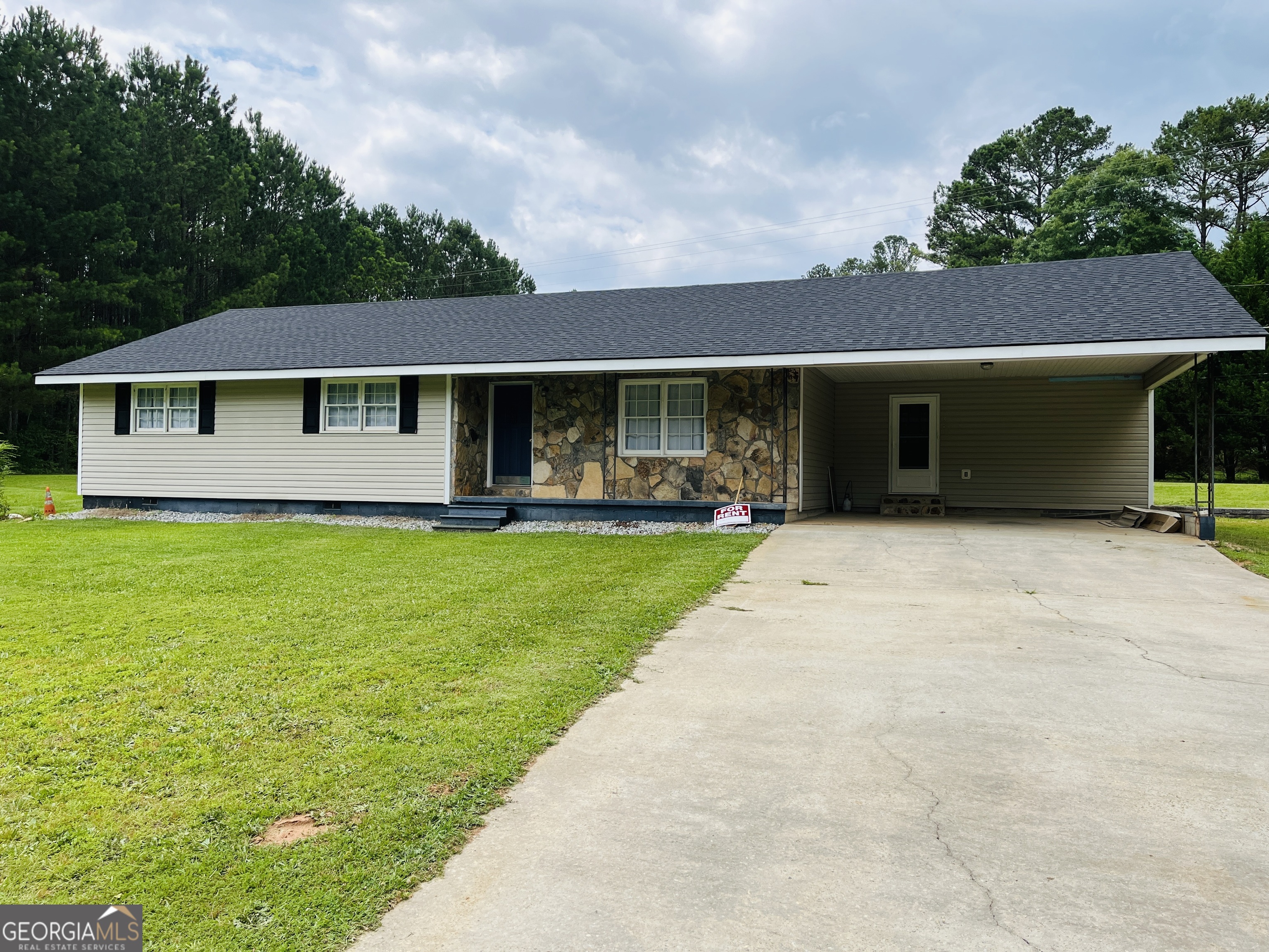 Renovated countryside 4 bedroom 2 bathroom ranch on 2 acres! Enjoy the quiet of the country! All new paint, new LVP, new countertops, new carpet and so much more! Must see! Lawn care included! i Disclosure- Tenants will not have access to the shed. The fireplace is not a functioning fireplace.