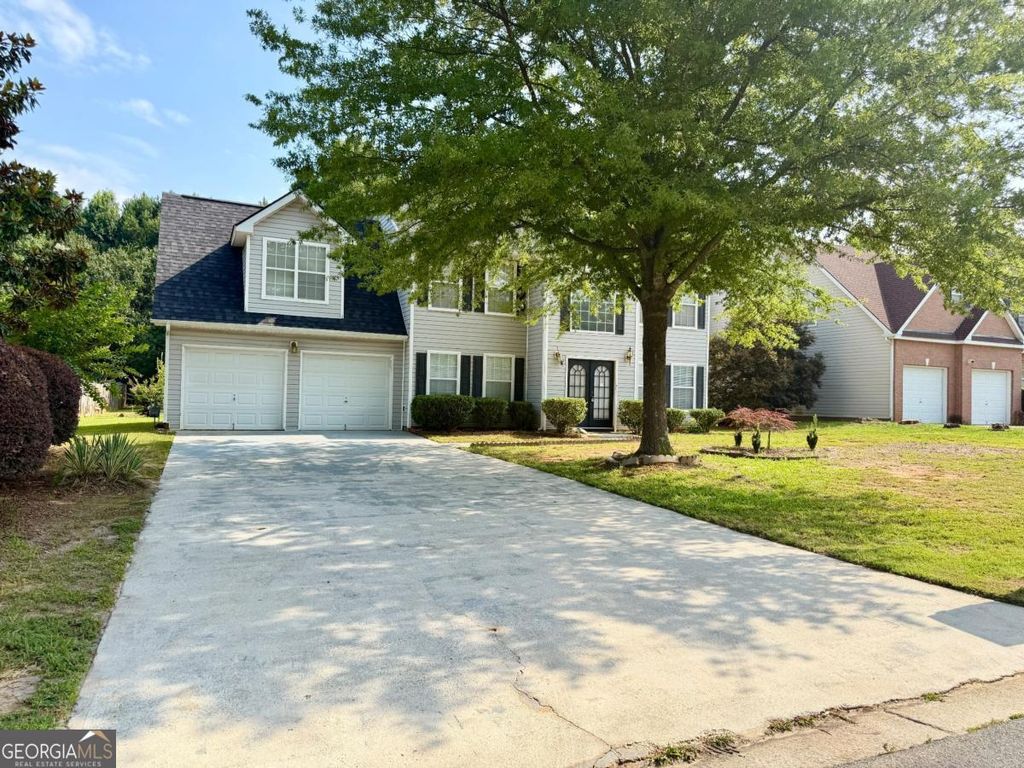 Photo of 2457 Wall Street SE, Conyers, GA 30013 (MLS # 10799076)