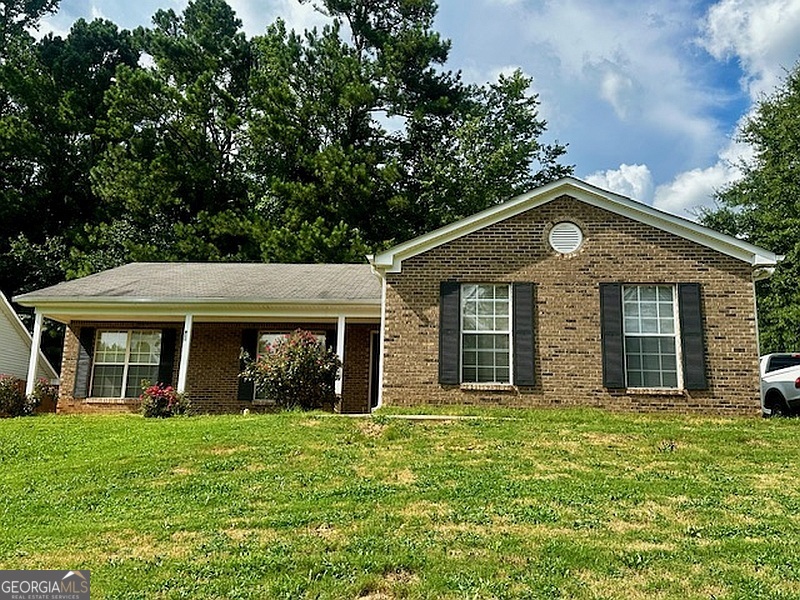 Welcome to this cozy and inviting one-story home-perfect for first-time buyers or those looking to downsize. Relax on the welcoming front porch before stepping into a spacious living room featuring a beautiful fireplace that adds warmth and character. Enjoy meals in the separate formal dining room or the bright and cheerful breakfast area. This home also includes an attached garage for added convenience and storage. Ideally located just minutes from the airport and downtown Atlanta.
