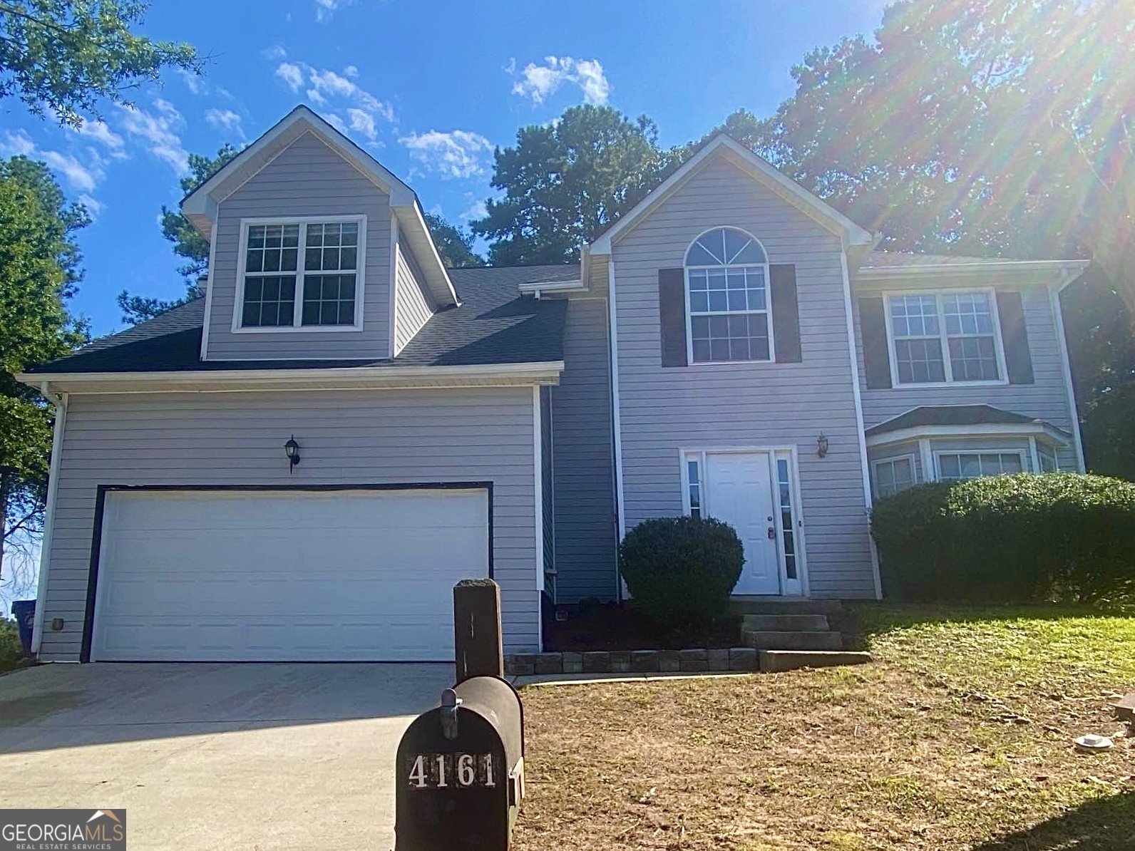 This beautiful 2-story traditional home in the quiet Ward Lake Estates community offers 4 spacious bedrooms and 2.5 baths across nearly 2,500 sq. ft. of living space. Featuring a bright open floor plan, the home includes a cozy family room, formal dining area, and a kitchen equipped with new stainless steel appliances. Upstairs, you'll find generously sized bedrooms and plenty of closet space, making it perfect for families. The home sits on a cul-de-sac lot with a level yard that's ideal for children to play or for outdoor entertaining. Located in DeKalb County, this home is just minutes from Village Park in Ellenwood, with easy access to I-675 and I-285, plus close to shopping, dining, and schools. Don't miss this opportunity to lease a move-in ready home in a desirable neighborhood!