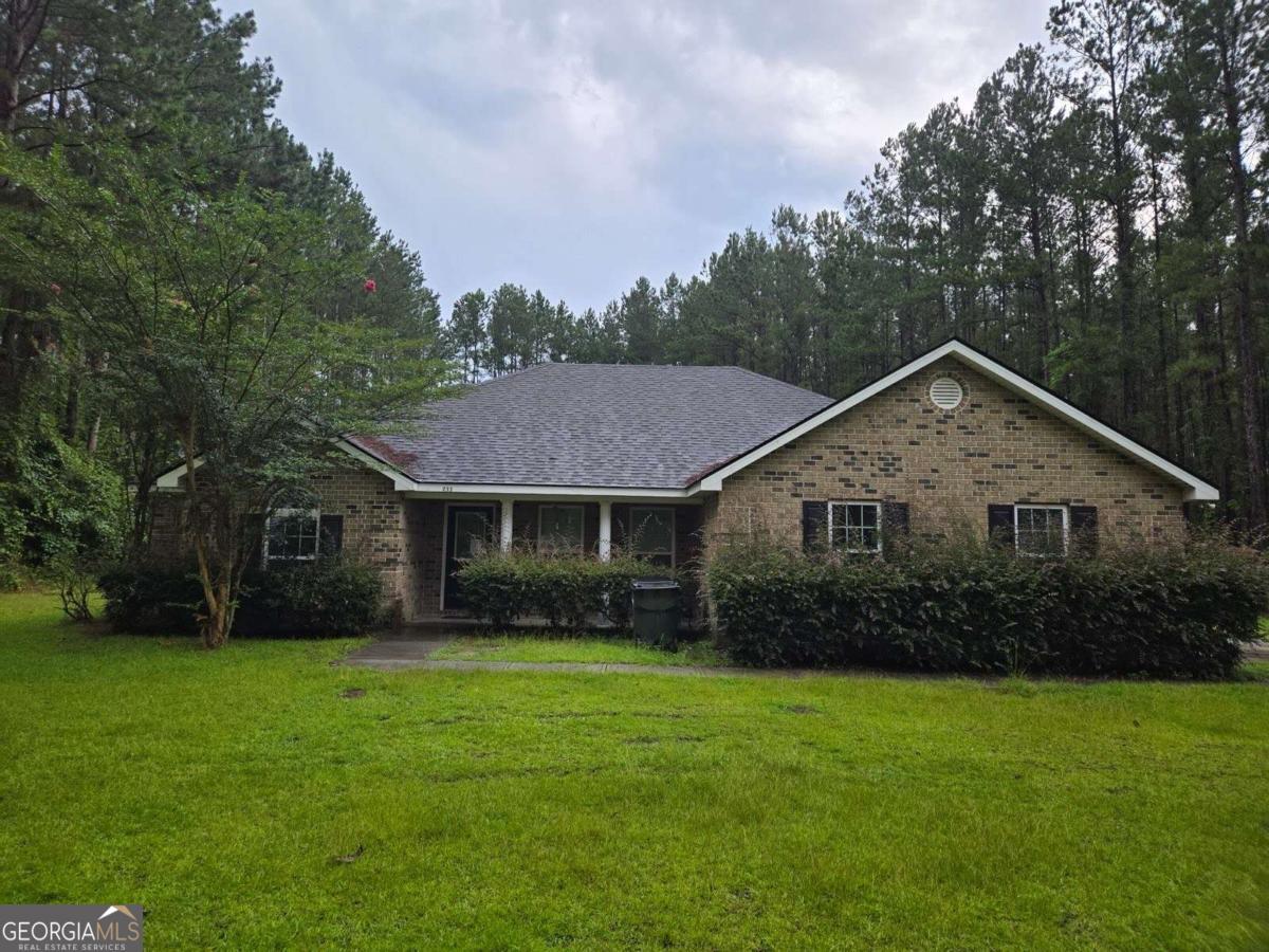 Short Sale. Property is being sold as is. Welcome to 233 Vickers Pass Dr in Ludowici, GA! Tucked away in a quiet cul-de-sac, this spacious 4-bedroom, 2.5-bath home sits on over 2 acres of land, offering the perfect blend of privacy and room to roam. Inside, you'll find a well-designed floor plan with generous living spaces, a modern kitchen, and a large primary suite. Step outside to enjoy the peaceful surroundings and plenty of space for outdoor living, entertaining, or even adding a pool or garden. Whether you're looking for country charm or a private retreat close to town, this home checks all the boxes!