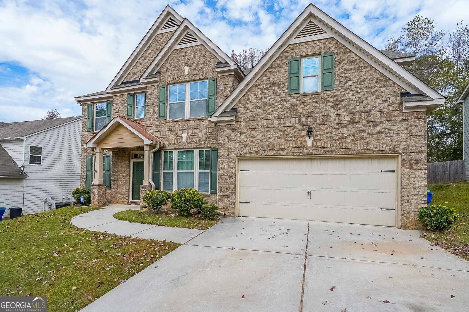 Spacious entertainers delight! Brand new hardwood floors on both levels of the home. Home features a two-story entry flanked by a formal living room and separate dining room with coffered ceiling. The large family room features a trey ceiling and gas fireplace with stone hearth. The cook's kitchen features granite counters, tons of counter space, stainless steel appliances, walk-in pantry and breakfast room with ceramic tile floors. There is a full bedroom and bath on the main level. Main level features hardwoods and neutral colors. The owner suite features a vaulted bedroom and separate sitting room with fireplace. The owner bath features a double vanity, soaking tub, tile shower and large walk-in closet. The guest bedrooms are vaulted and share a hall bath. The laundry is upstairs. Two car garage.