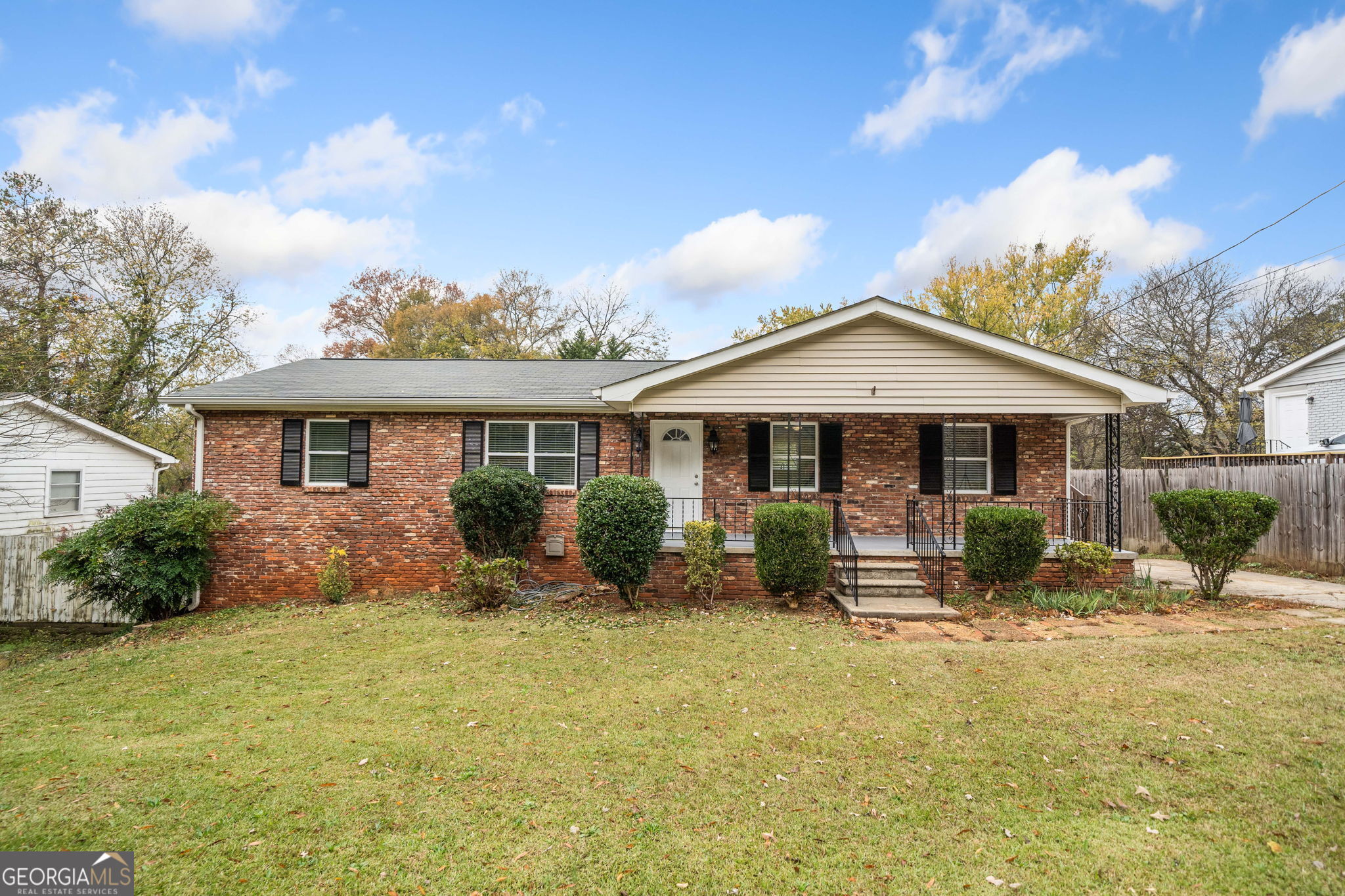 This beautifully renovated two-sided brick ranch on a basement boasts a perfect blend of modern amenities and classic charm, offering an ideal living space. All of the big ticket items have been taken care of for the new owner: plumbing, electrical, roof, new water line from street to the house. Cook to your heart's content in the updated kitchen with stainless steel appliances, stone countertops and ample counter space. The bathrooms have been renovated and there is a half bath with a utility sink in the basement. Enjoy the continuity and warmth of all laminate wood flooring on the main level, creating a cohesive and inviting atmosphere. The spacious daylight basement includes a convenient boat door, half bath, and an abundance of storage shelves, ideal for hobbies or creating additional living space. A newly rebuilt 320 sq. foot shed offers additional storage or workshop potential. The backyard is partially fenced and can easily be completed. This home is truly move-in ready, combining modern updates with classic style. Conveniently located near I-75 for easy interstate access. Don't miss the opportunity to make this stunning property yours!
