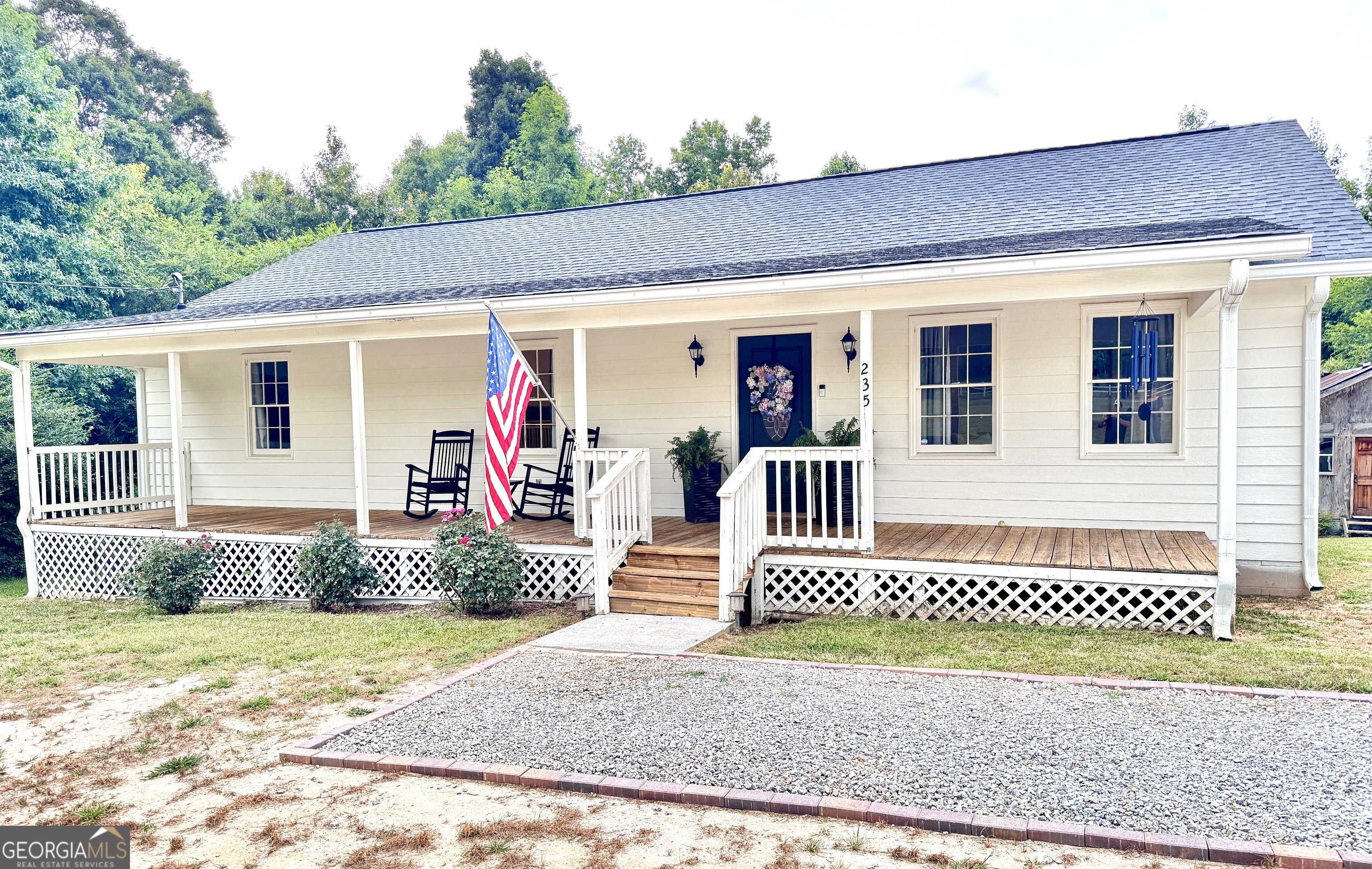 Charming Renovated Farmhouse on Over 2 Acres - No HOA! Escape the hustle and enjoy peaceful country living in this beautifully renovated farmhouse, set on more than two acres of flat, usable land with no HOA restrictions. This private retreat offers 3 generous bedrooms and 2 full bathrooms, thoughtfully updated just a couple of years ago with stylish flooring, fresh paint, and modern lighting throughout. Relax and unwind on the expansive front porch, the perfect spot for rocking chairs and summer afternoons. Step inside to an open-concept living area filled with natural light and timeless finishes. The kitchen shines with stainless steel appliances, granite countertops, and a subway tile backsplash, all installed during the renovation and still in great condition. The home also includes a relatively new HVAC system, offering peace of mind and year-round comfort. Whether you're looking for space, serenity, or a place to garden, build, or simply breathe, this move-in-ready farmhouse checks all the boxes. Schedule your private tour today - properties like this don't last long! Schedule your showing SOON!!!