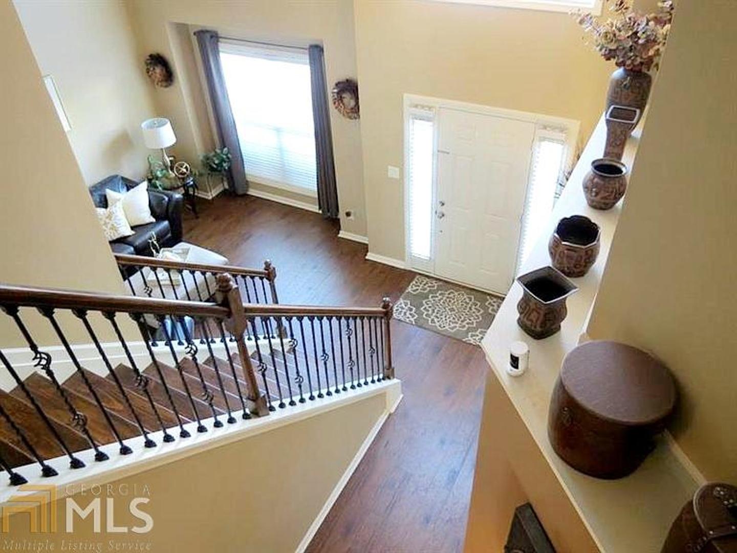 A 4 bedroom, 2.5 bathroom home in a swim and tennis community. This marvelous home has features new homes cant afford to give you at a reasonable price. Talking about hardwood floor on main, hardwood stairway and cathedral like walk way. kitchen features granite counter top, breakfast bar, separate eat in area, tile floor and upgraded cabinet. Powder room with accentuated tile wall, upscale sink & faucet. New furnace, thermostat with wi-fi compatibility-like a smart home. Water efficient toilet system. Master bedroom with accentuated solid wood wall for luxury, bathroom with tile floor, separate Tile shower and tub. Master closet with customized shelving system, value up to $4000. Call now for private viewing.