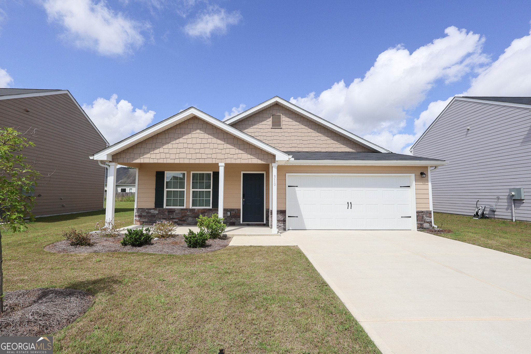 Come discover the charm of 310 London Court, tucked away in the welcoming Thomas Landing community! This beautiful 4-bedroom, 2-bath home was built in 2024 and feels like new from top to bottom. The inviting layout offers a bright, open living space and a kitchen you'll love-complete with stainless steel appliances. Step out back to enjoy a freshly fenced yard, perfect for gatherings, playtime, or simply relaxing. With everyday conveniences like shopping and dining just around the corner, this home makes it easy to love where you live.