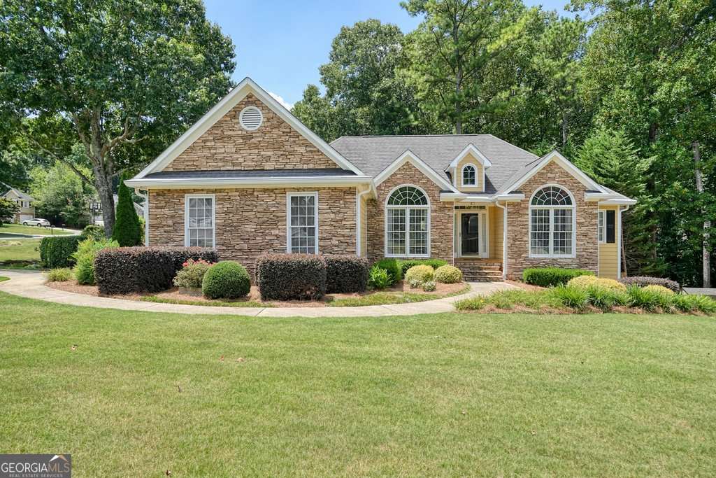 Discover Your DREAM HOME!! A stunning three-bedroom, two full bath, room-mate style ranch Haven with 11ft ceilings, large master suite with your own personal study, updated bathrooms including his & her sinks in both. Lovely open living room, stunning kitchen, Breakfast nook with a serene screened in porch with gorgeous wood ceilings and a convenient pull in two car garage. DOWNSTAIRS, a fully functional basement apartment boasts its own washer and dryer, full kitchen with breakfast bar, walk-in bathroom, master suite with walk-in closet, two versatile bonus rooms, living room & dining space with own entrance, and a patio, offering endless possibilities. They thought of everything with dual AC Units & furnaces, a 200-amp Box. This Home ensures a comfortable living space, empowering you to thrive. INCOME POSSIBILITIES HOA community (Tennis/Pool/Playground)