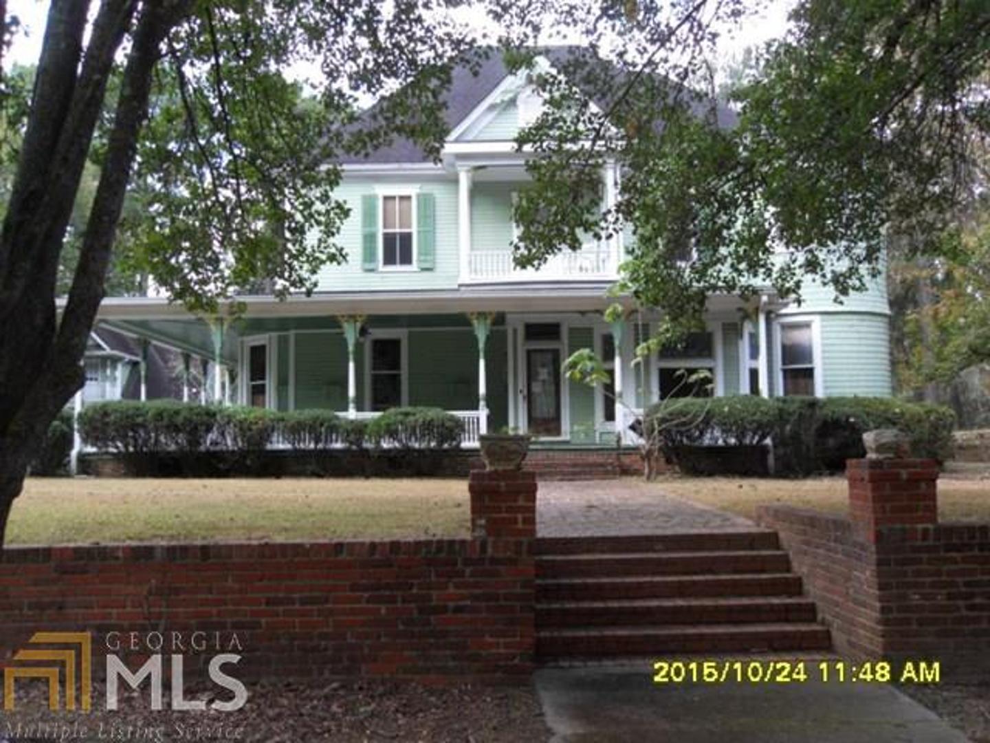 This beautiful Victorian style home sits on a 10+- acre lot with fenced yard, stable barn, mechanics garage, basketball court, wrap-around porch, detached converted garage with 1 bedroom 1 bath and great/living room area. Home features formal living and dining area, library /office area, 7 fireplaces, 2 bedrooms on main level, hardwood throughout, adequate sq ft, DON'T MISS THIS ONE, Easy Show! See Attachment for PAS requirements and WFHM offer submittal information in MLS document section
