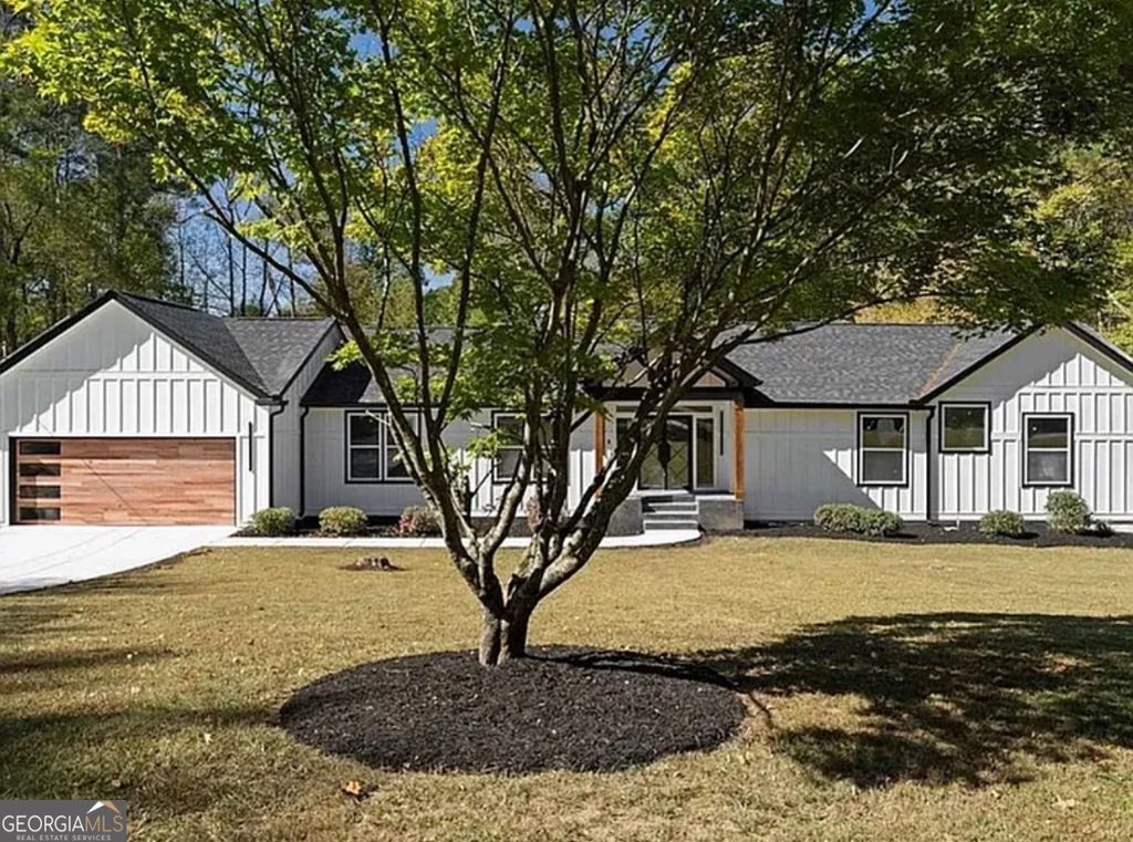 Photo of 7530 Spalding Lane, Atlanta, GA 30350 (MLS # 10782347)