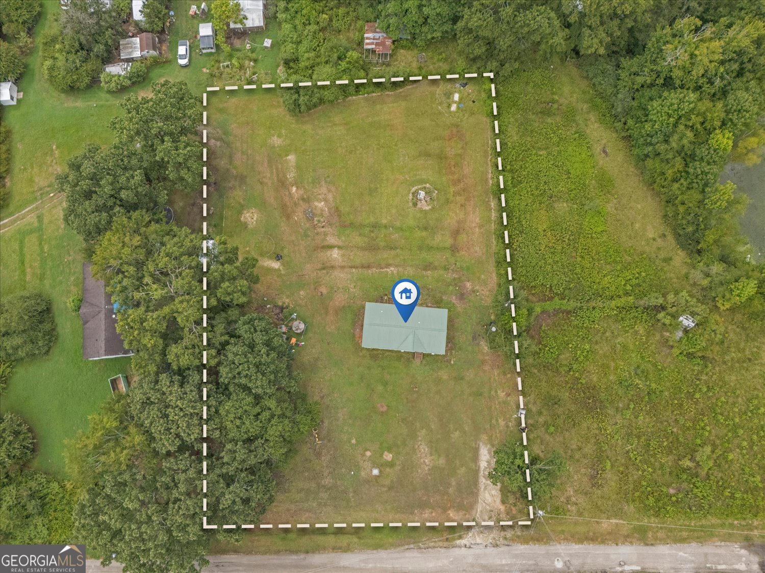 This 3-bedroom, 2-bathroom mobile home sits on a full 1-acre lot and offers an excellent opportunity for buyers seeking space, privacy, and potential. The property features expansive front and back yards, ideal for outdoor living, gardening, pets, or future improvements. Inside, the functional split-bedroom floor plan includes a spacious living room, dedicated dining area, and large primary suite with private bath. Two additional bedrooms and a second full bathroom provide flexibility for family, guests, or home office needs. A brand-new well system was installed in March 2025, ensuring reliable water access and long-term peace of mind. The home is currently livable but would benefit from cosmetic and functional updates-making it a strong value-add opportunity for investors, flippers, or handy buyers looking to build equity. With no HOA or restrictions, owners enjoy the freedom to improve or enjoy the property as they choose. Motivated seller-bring all offers!