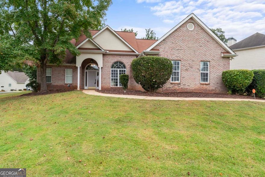 Welcome to this beautifully maintained 3-bedroom, 2-bath ranch-style home, perfectly situated on a well-landscaped corner lot. This inviting residence is move-in ready and offers a functional layout which includes a spacious family room that flows seamlessly into a separate dining area-complete with a large window, plenty of natural light and gorgeous flooring throughout. The kitchen connects easily to the main living areas, creating a warm and welcoming atmosphere. On one end of the home you will find two nicely sized bedrooms plus a full bath. Moving over to the other side of the home you are met with the primary suite that features a generously sized bathroom and ensuite. Lets not forget the beautifully landscaped yard that offers wonderful curb appeal! With the combined spacious floor plan, numerous features and exterior charm, this home is sure to go fast! Schedule your showing today!