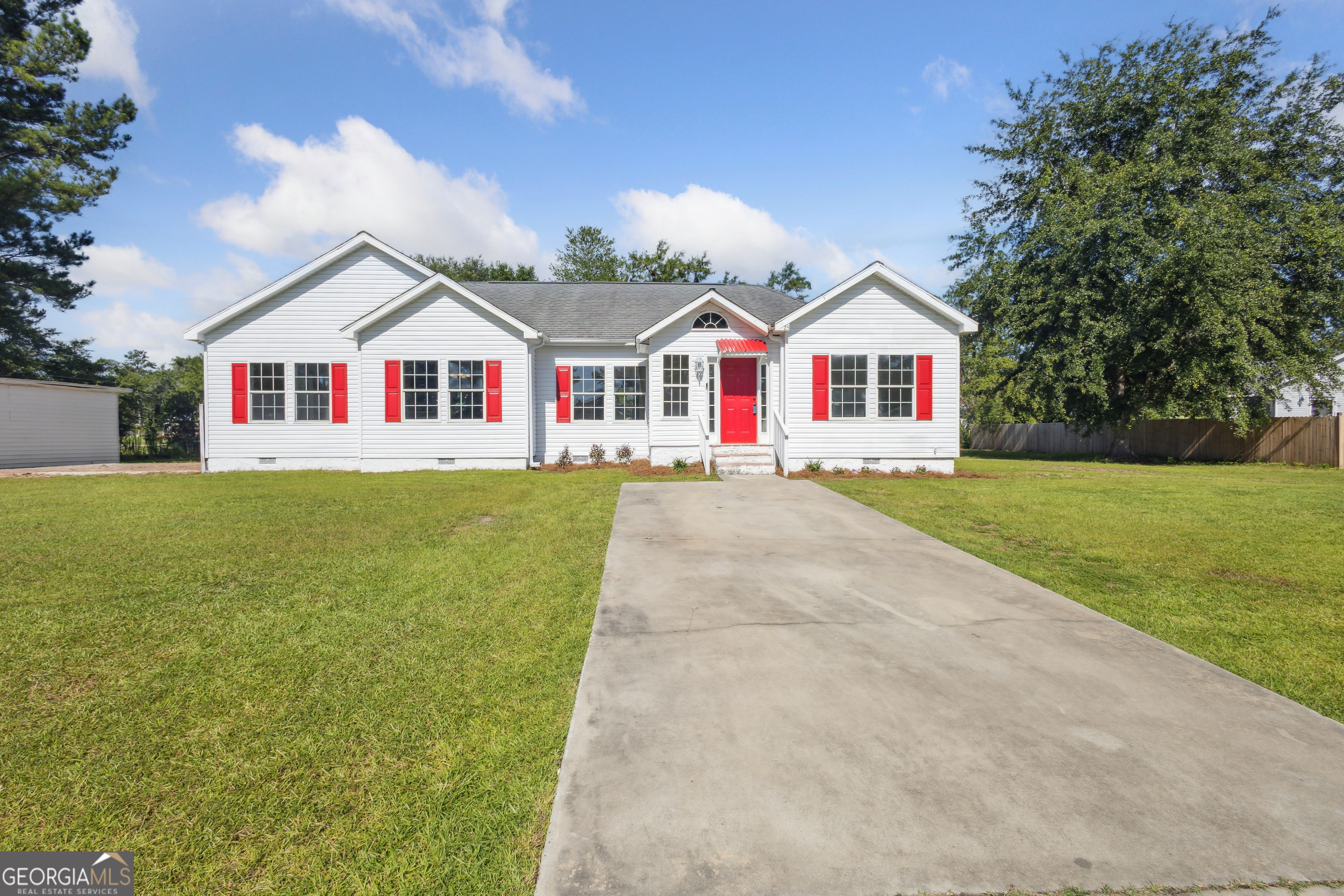 Seller offering $8000 towards Closing Costs!!! Welcome to this beautifully renovated 3-bedroom, 2-bathroom home offering 1,920 square feet located in Long County on a corner lot. From top to bottom, this home has been transformed to meet the needs of today's lifestyle including a brand-new roof (scheduled for June 23). Step inside to an open-concept layout that seamlessly connects the spacious living room, formal dining area, and a large kitchen featuring all-new appliances and breakfast area. Whether you're entertaining or enjoying a quiet night in, this space delivers both function and flair. The primary suite offers a serene retreat with an updated en-suite bathroom, jacuzzi tub and ample closet space. Two additional bedrooms and a second full bath provide plenty of room for family, guests, or a home office. Located in a quiet, well-established neighborhood in the Long County school district, this home is truly move-in ready. Don't miss this one, schedule your private showing today! Seller is a licensed Realtor in GA.