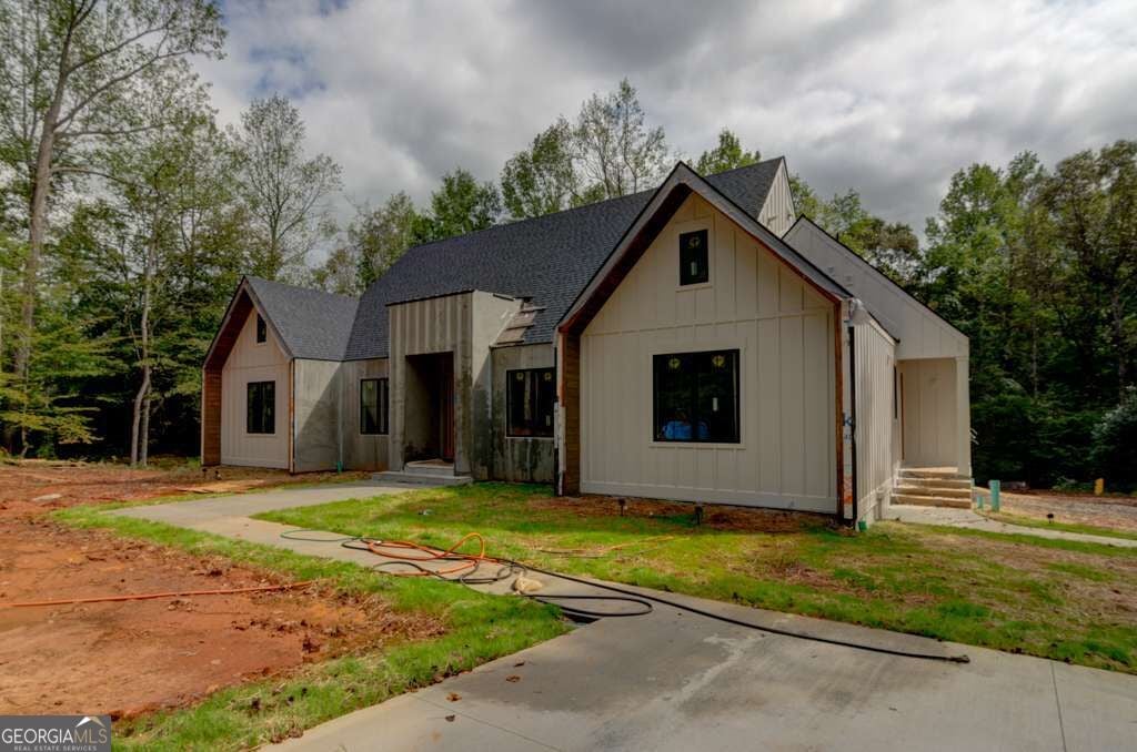 Photo of 7405 Nicholson Road, Cumming, GA 30028 (MLS # 10874902)