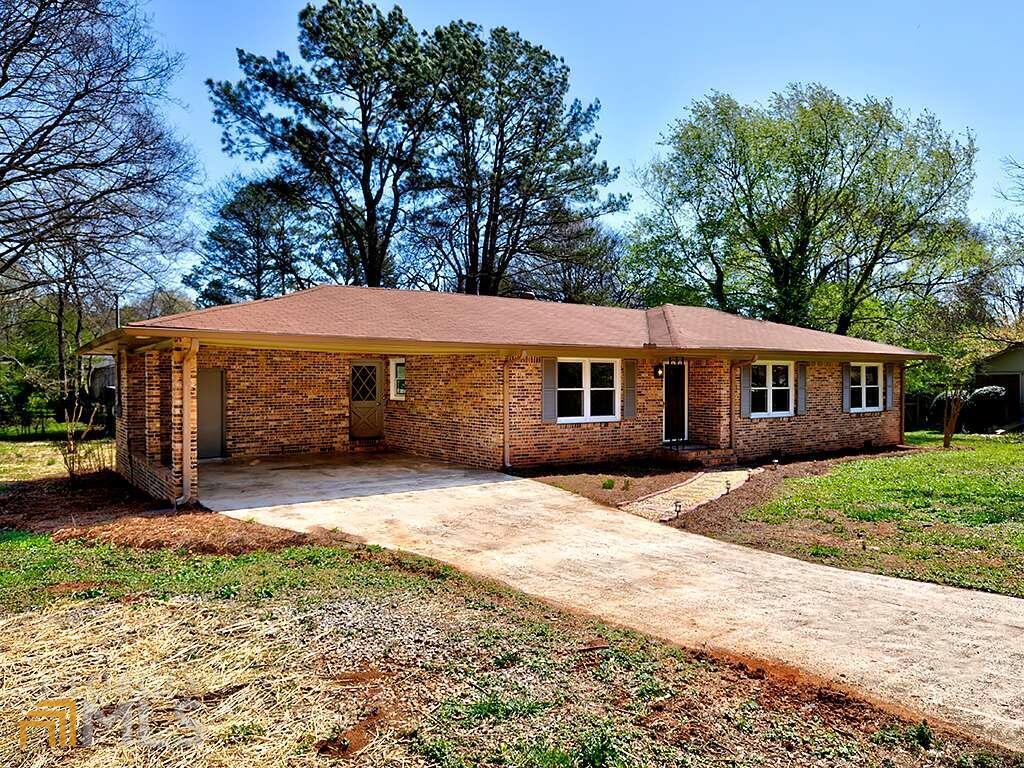 Just Renovated and Priced to Sell! 3BR/2BA 4-Sides Brick Traditional Ranch in Established Cedartown Neighborhood. Updates Include: All New Subfloor/Joists and HVAC Ducting Systems, Attic Insulation, Updated Plumbing & Fixtures, New Electrical Panel & Outlets, Huge New Back Deck, LVP Flooring and Carpeted BR's, Freshly Painted Interior/Exterior, Lighting Package Throughout, 2 Completely Renovated Full Bathrooms with Ceramic Tile, Vanities & Fixtures. Beautiful Custom Oak Kitchen Cabinets, Stainless Steel Appliance Package, Granite Countertops & More! 2 Car Carport, Utility Room and 16 x 10 Metal Outbuilding. Close to Shopping, Entertainment, Dining & More!