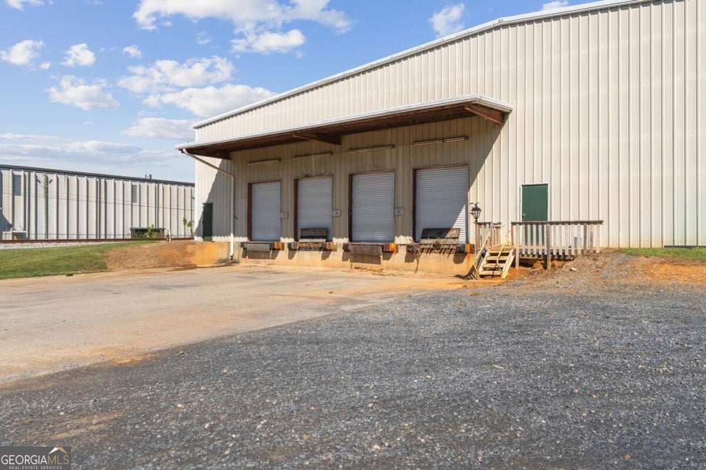 Photo of 100 Thomas Street, Calhoun, GA 30701 (MLS # 10873312)