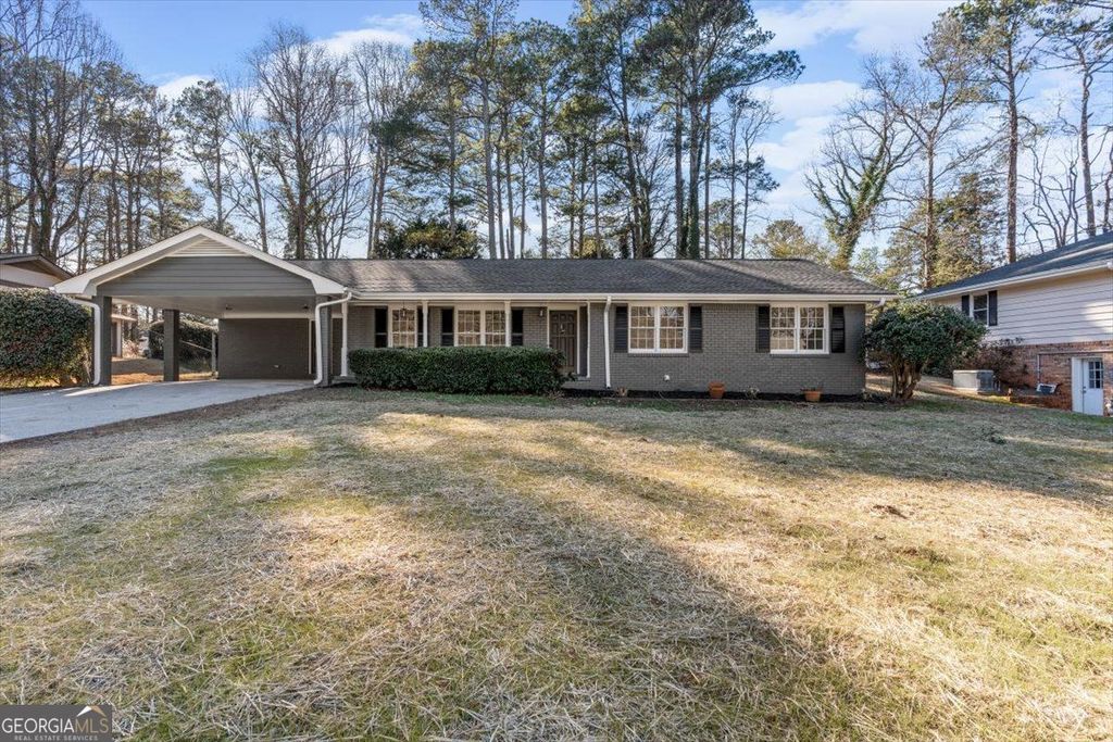 Photo of 395 Ben Avenue SW, Lilburn, GA 30047 (MLS # 10688167)