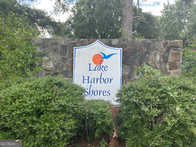 If privacy and peace are what you're after, this 0.39-acre lot in Lake Harbor Shores might be exactly what you need. Set back on a quiet, lightly traveled road, this parcel offers a truly secluded feel-surrounded by dense woods and natural beauty. The road leading in is rustic, adding to the sense of being off the beaten path-perfect for those who value quiet, privacy, and a slower pace of life. It's an ideal setting for a weekend cabin, a full-time home tucked into the trees, or simply a long-term investment in land near the lake. Lake Harbor Shores residents also enjoy access to a private community boat ramp, making it easy to get out on the water for fishing, boating, or relaxing by the shore. If you're looking for space, seclusion, and lake access in a natural setting, this lot is definitely worth a look.