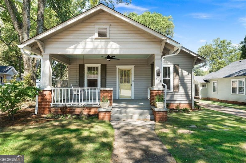 Just Listed - Historic Cartersville Bungalow with Carriage House Charming 2 bedroom, 1 bath bungalow located in the heart of Historic Cartersville, just a short walk to downtown shopping, dining, and entertainment. The main house features hardwood floors throughout, two fireplaces, a large open kitchen, clawfoot tub, updated wiring, and new gutters. The property also includes a 1 bedroom, 1 bath carriage house complete with a full kitchen. Perfect for use as an in-law suite, teen retreat, or rental for additional income. A rare opportunity to own a piece of history with modern updates and flexible living space in a highly sought-after location. Schedule your private showing today!
