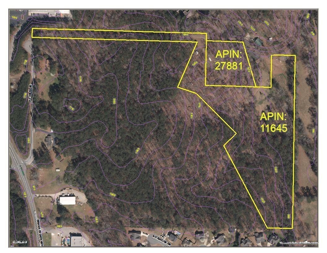 Land is rolling from elevation 1,110 to 990 feet, zoned R-2, suburban sewered residential allowing approximately 2 single family homes per acre. There is no sewer on the property however within 500'.