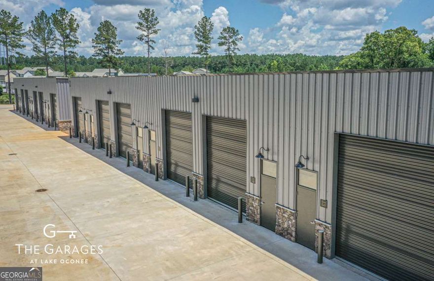 The FINAL phase of the Garages is under construction, which will bring the total Garages to 91.  Scheduled for completion in 2026.    Tired of renting storage?  Buy your own!  Unit J-10 is a corner unit in the new construction building!!The Garages at Lake Oconee is a luxury garage development, located off of Highway 44 in Greensboro, GA. The 1200 SF units are fee-simple, low maintenance and flexible for many uses. Need a man-cave, diva den, she-shed, personal storage or storage for your business? With 18-20.5' ceiling height, you are able to store a large RV/motorhome, your boat or holiday decorations. Or, you can use it to display memorabilia, host game nights or work on a custom car. Units can be customized after closing with upgrades including cabinetry, flooring, mezzanines and security systems. Units are 22' X 54.5' and feature many amenities, including HVAC, LED industrial lighting, 125 AMP service panel, 12' X 14' motorized insulated garage door, a pedestrian door with transom window, restroom with toilet and lavatory with faucet, floor drains in restroom and an industrial floor sink. Get yours now!! They will sell out quickly!