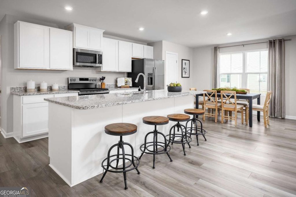 Photo of 904 Inman Avenue, Hampton, GA 30228 (MLS # 10728724)