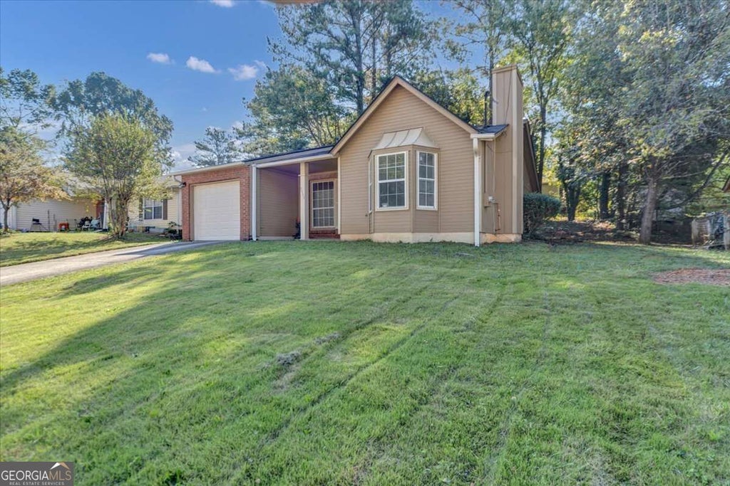 Photo of 5523 Marbut Forest Way, Lithonia, GA 30058 (MLS # 10878365)
