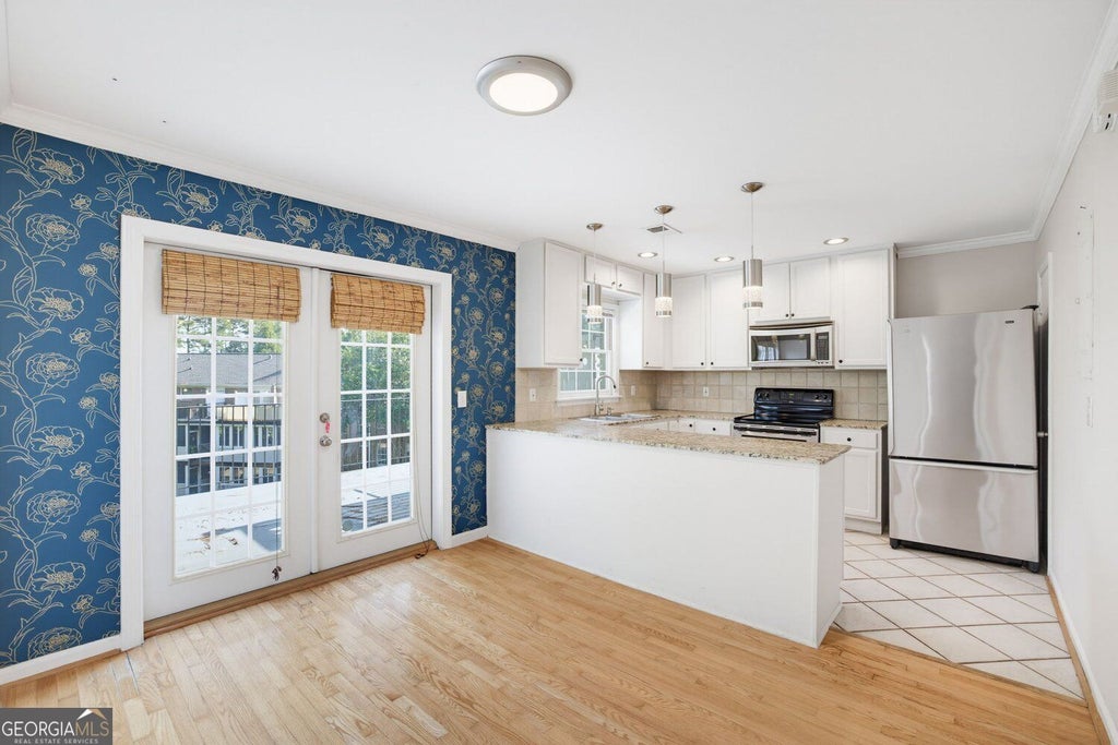 Photo of 1101 NW Collier Road NW #T5, Atlanta, GA 30318 (MLS # 10850356)