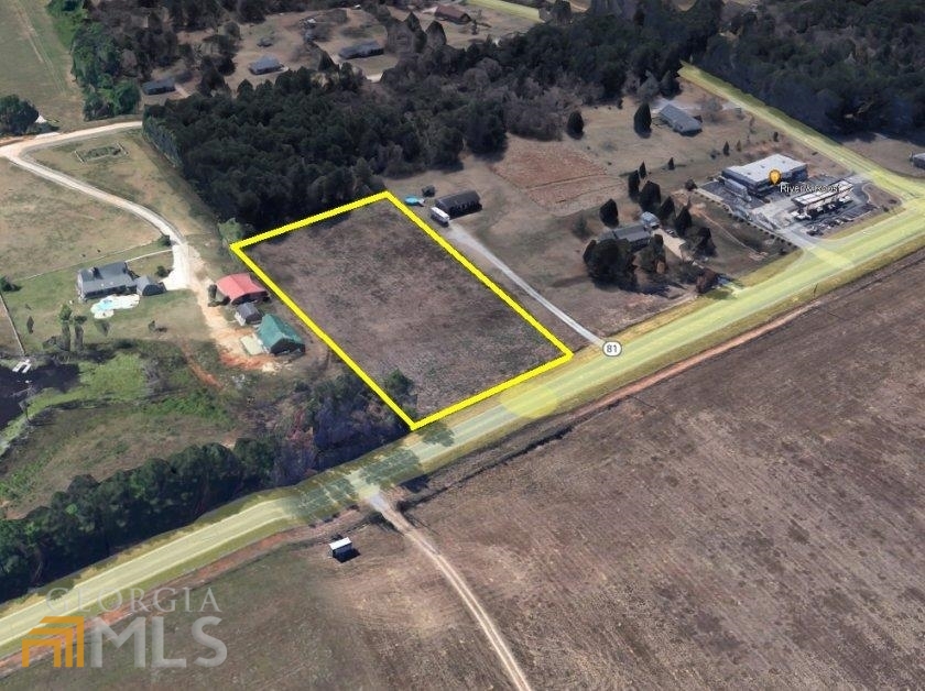 2.37+/- acres available in Henry County located on Highway 81 near Keys Ferry Road in the Growing Ola Area. This open lot is located in a great area just moments from the newly constructed Publix / Shoppes at Ola Crossroads Shopping Center. Tons of growth in this area, and this parcel is primed and ready.