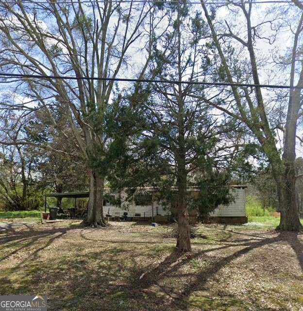 Photo of 4338 Wagon Trail, Loganville, GA 30052 (MLS # 10814065)