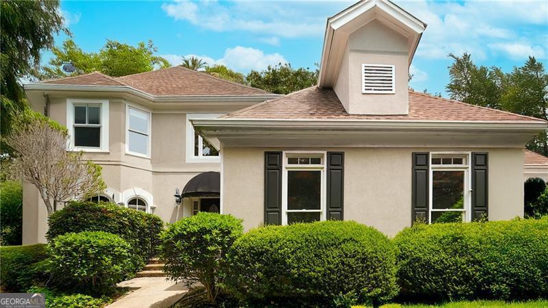 The home can be purchased for $1,090,000 fully furnished. This stately 6 bedroom, 5.5 bath East Cobb home is located on a landscaped, private cul-de-sac lot and comes with upgrades galore! The large master suite includes a fabulous, renovated master bath, fireplace, and huge walk-in closet and beautiful new floors. The 2nd master bedroom boasts a spacious walk - in closet and bath, and the designer Jack and Jill bedrooms are roomy and well-appointed. The home has too many upgrades to list including two kitchens, new bathroom (lower level), new gas stoves, high end appliances and new flooring. The lower level has a separate entrance and 2 bedrooms, 2 full bathrooms, full kitchen, new LG washer/dryer and huge closet/workspace - and gives you the option of multigenerational living or even as a rental suite (historically this has been rented ~$2k)! This executive home, in the highly coveted Lost Forrest subdivision and the top rated Pope High School district, comes with wonderful amenities including clubhouse, pool, playground, active tennis and pickle ball. ALTA teams, pickle ball groups and organized activities for youth and adults are part of what makes Lost Forrest special! This gorgeous light and bright open floor plan comes fully furnished (or without furniture). The kitchen has been remodeled with stainless appliances, gas range, fabulous quartzite countertops and custom cabinets. There is an open breakfast room and charming vaulted living room with fireplace. The updated baths have quartzite or marble countertops, and the oversized laundry room is on the main level. The main level has a flowing functional floor plan with a spacious living room and den and is perfect for entertaining friends and family. Outdoors there is a private backyard with a rock fountain and large patio for endless relaxation. This hard coat stucco home comes well-appointed and is move in ready --Welcome home!