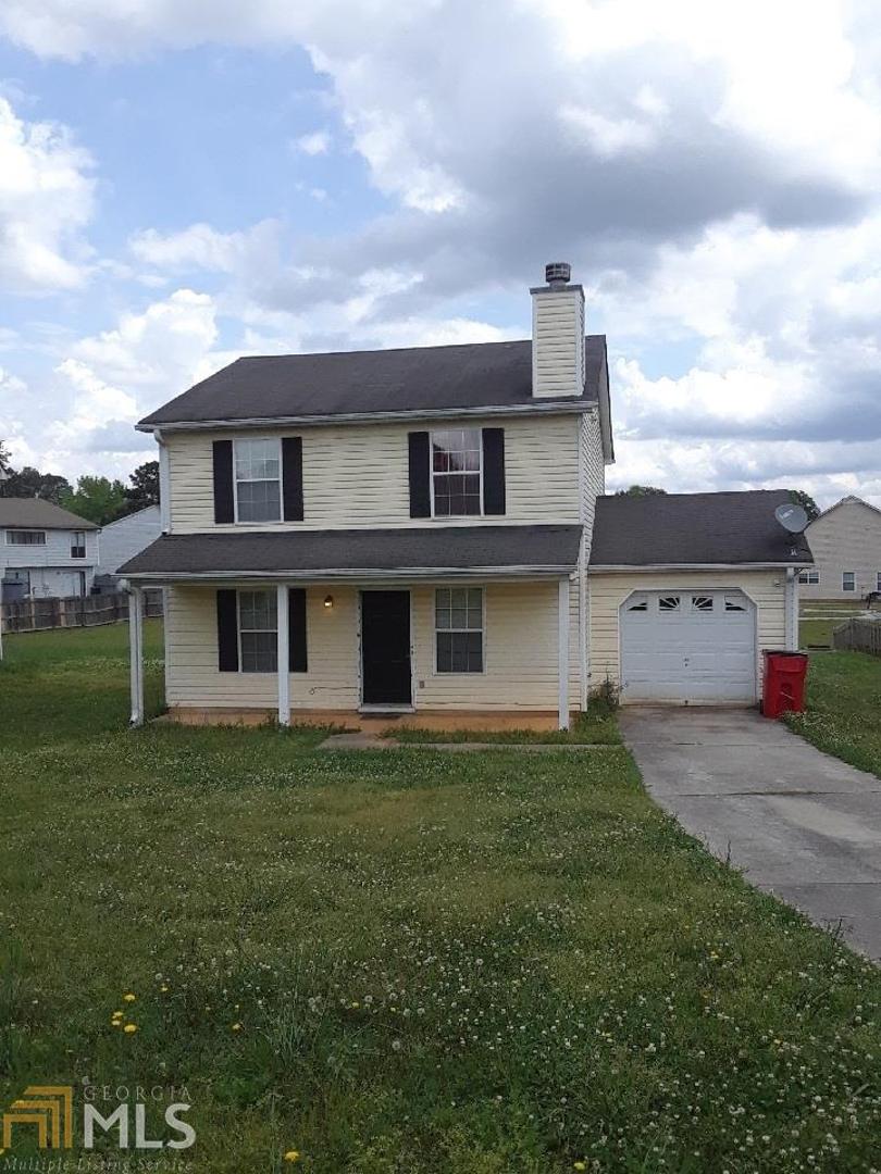 Come see this 4 bedroom, 3 full bath, quaint great room with a cozy fireplace with tons of closet space throughout the house. This home has a wireless alarm system, washer & dryer, a brand new hot water heater and new ceiling fans in the bedrooms. 1 year home warranty will be included at closing. The home will also be pressure washed and the lawn manicured by the time you move in. All that's needed is a fresh coat a paint, new flooring and your own personal decor.