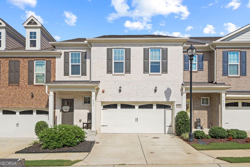 Welcome home to this like-new 3BR/2.5BA townhome combining modern comfort with timeless charm. The open floor plan features a shiplap-accented foyer, hardwood floors, granite countertops, stainless steel appliances, and a builder-upgraded stone fireplace. Enjoy the bright sunroom with barn door for added flex space. Freshly painted with brand-new carpet upstairs. The owner's suite boasts a tray ceiling, walk-in closet, and spa-like bath with double vanities and walk-in shower. Upstairs also includes a loft, 2 secondary bedrooms, and full guest bath. Community amenities include pool, clubhouse, playground, sidewalks, and greenway. Minutes to shopping, dining, and major interstates!