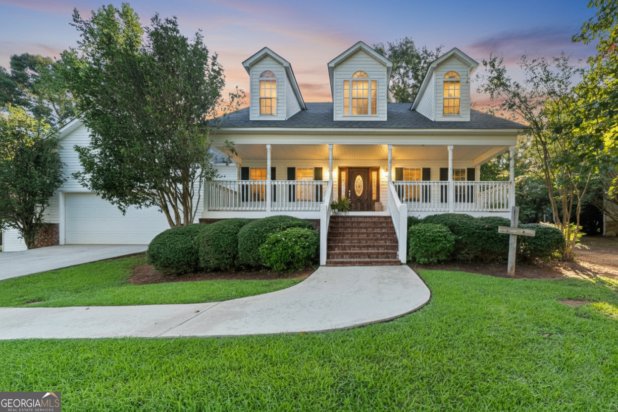 Located in a desirable site-built-only subdivision, this beautifully maintained Cape Cod-style home offers 5 bedrooms and 3 full baths with a thoughtful floor plan designed for comfort and functionality. The spacious master suite features a vaulted trey ceiling, hardwood floors, a huge walk-in closet, and a luxurious bath with tiled floors, a doorless shower, and a soaking tub. The open kitchen with breakfast area flows seamlessly into the vaulted family room with a cozy fireplace, while the formal dining room boasts a large walk-in storage pantry-perfect for serving dishes or small appliances. The main level also includes two additional bedrooms and a full bath. Upstairs, you'll find a landing overlooking the family room, along with two more bedrooms, a full bath, and floored attic space ideal for holiday decor or extra storage. Outdoor living is just as inviting, with a spacious rocking chair front porch and a private back deck made for grilling and entertaining. A 2-car attached garage completes this wonderful property in a prime Baldwin County location. Seller is offering a $10,000 Buyer Concession with an acceptable offer.