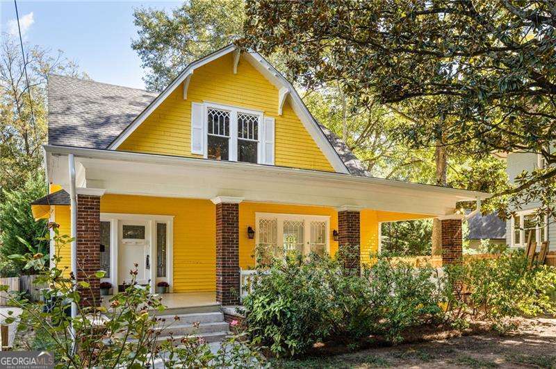 Tucked beneath the magnolia trees in the heart of Inman Park, this 1920s original is a one-of-a-kind opportunity to own a true piece of Atlanta's history. Every corner tells a story, from the gracious front porch made for lazy afternoons to the timeless details that give the home its unmistakable charm. Inside, the light filters through original windows, tall ceilings stretch overhead, and decorative fireplaces and stained glass accents nod to another era. The layout feels inviting and full of possibility, blending a sense of nostalgia with space to imagine your next chapter. Two welcoming living rooms and a formal dining space open to a sunny kitchen and back deck, perfect for gatherings that move easily indoors and out. A bedroom with ensuite bath on the main level adds flexibility, along with another bedroom and a full hall bath for guests or work-from-home space. Upstairs, the home opens to three additional bedrooms, including a spacious primary suite with a sitting room that feels like a private retreat. The backyard is where the story takes an unexpected and delightful turn. Designed and built by the previous owner's family, the custom skate park has become a local legend, skated by professionals and neighborhood friends alike. Whether you keep it as a creative landmark or transform it into your own outdoor sanctuary, it's a space that sparks imagination. Set on a quiet dead-end street with Freedom Park just across the way, this home captures the essence of Inman Park living-rich in history, full of personality, and surrounded by community. Steps from Freedom Park, Little Five Points, and your favorite Inman Park and Virginia Highland shops and restaurants, it's a rare find where timeless character meets endless possibility.